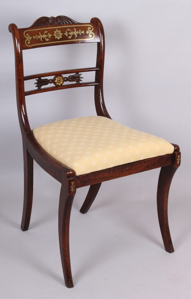 Set of eight early 19th century period simulated rosewood and brass inlaid dining-chairs of classic Regency form