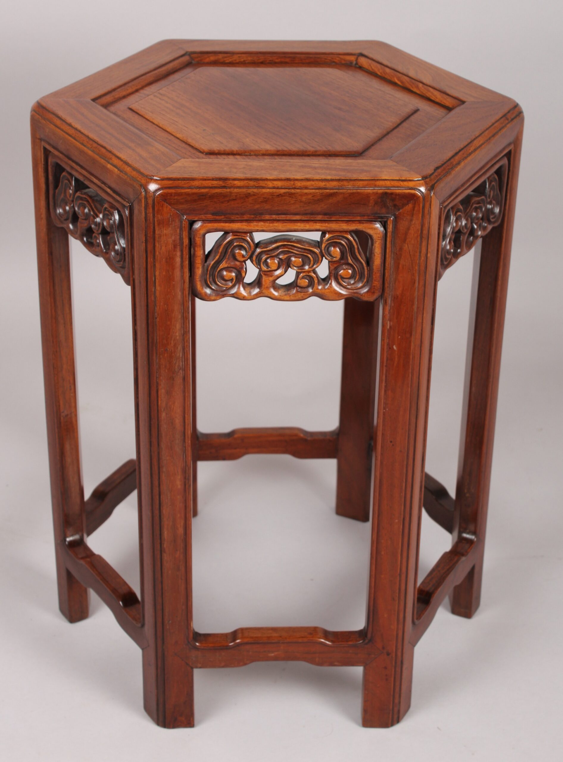 Rare pair of 19th century Chinese hardwood, probably Huanghuali, hexagonal tables