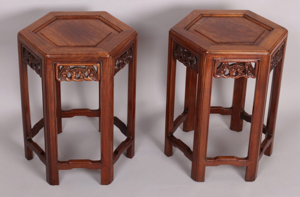 Rare pair of 19th century Chinese hardwood, probably Huanghuali, hexagonal tables