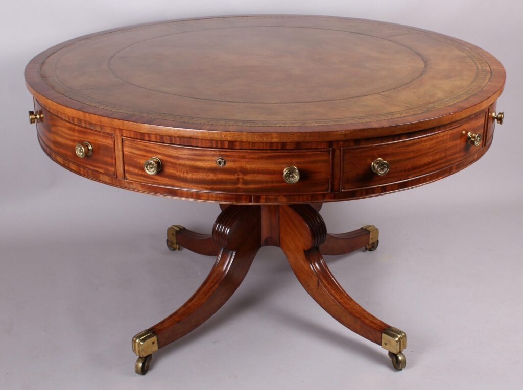 Late George III period mahogany drum table of fine quality