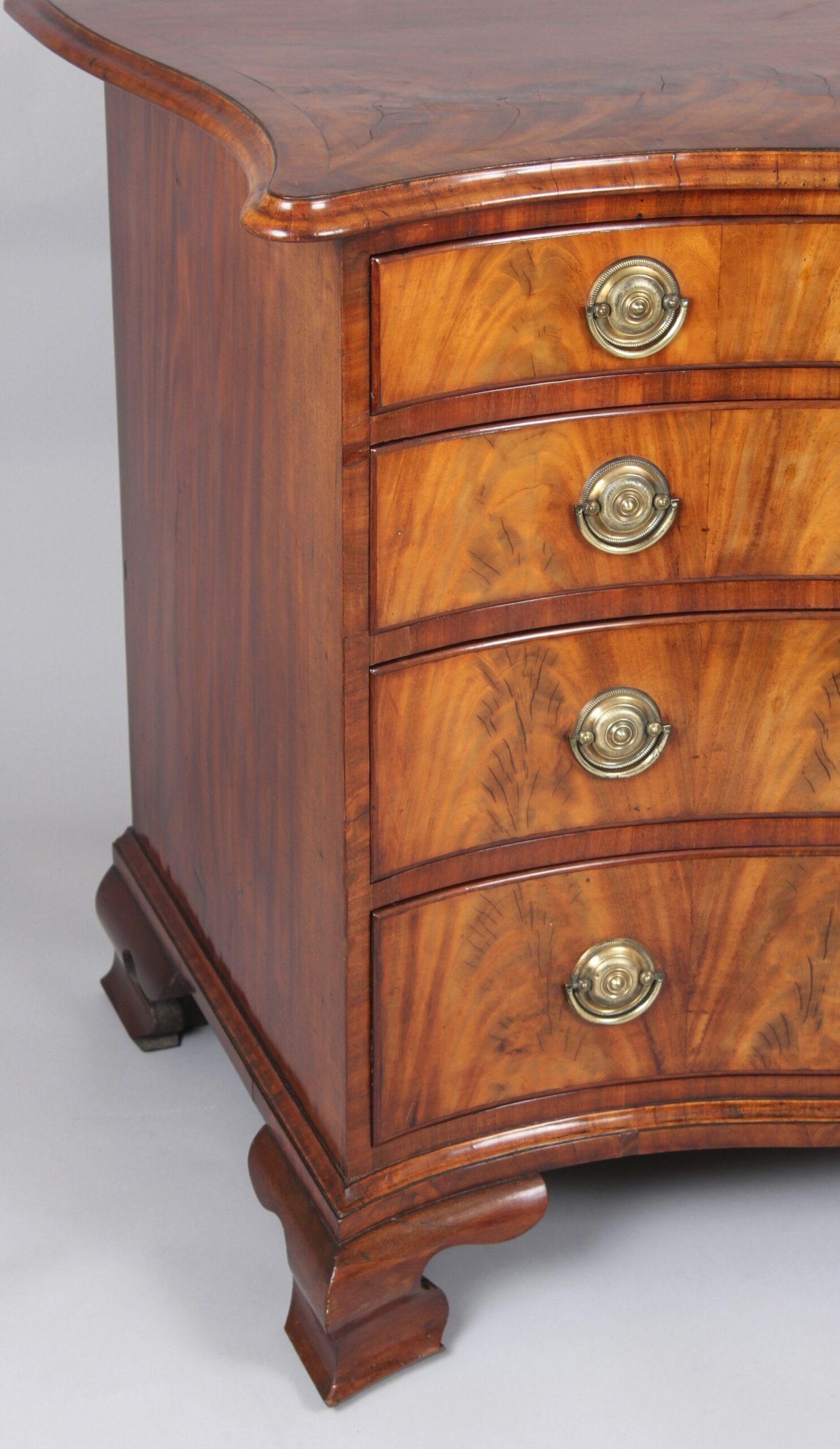George III period mahogany serpentine-fronted chest-of-drawers