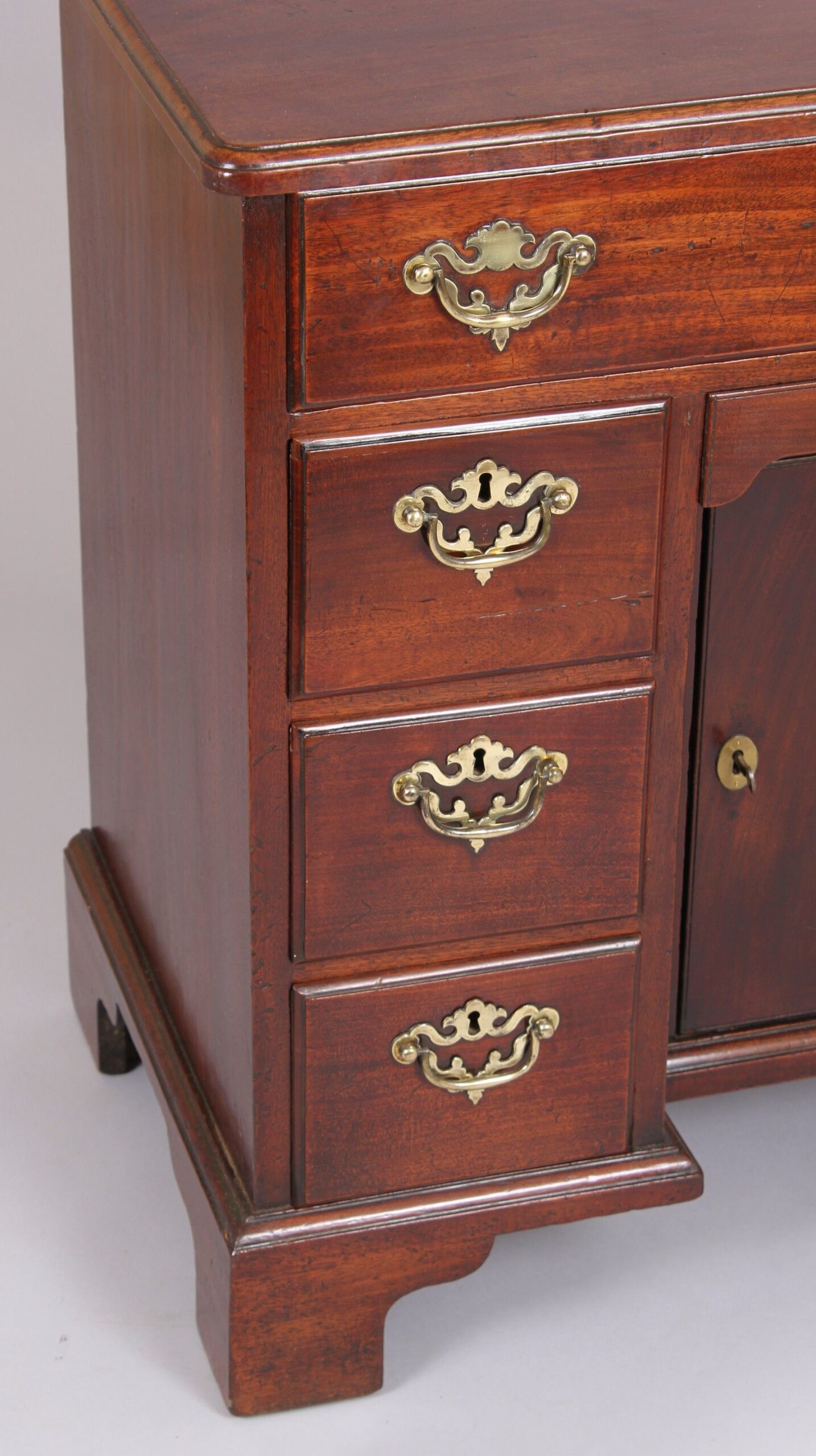 George II period mahogany kneehole dressing-table by Elizabeth Bell of London
