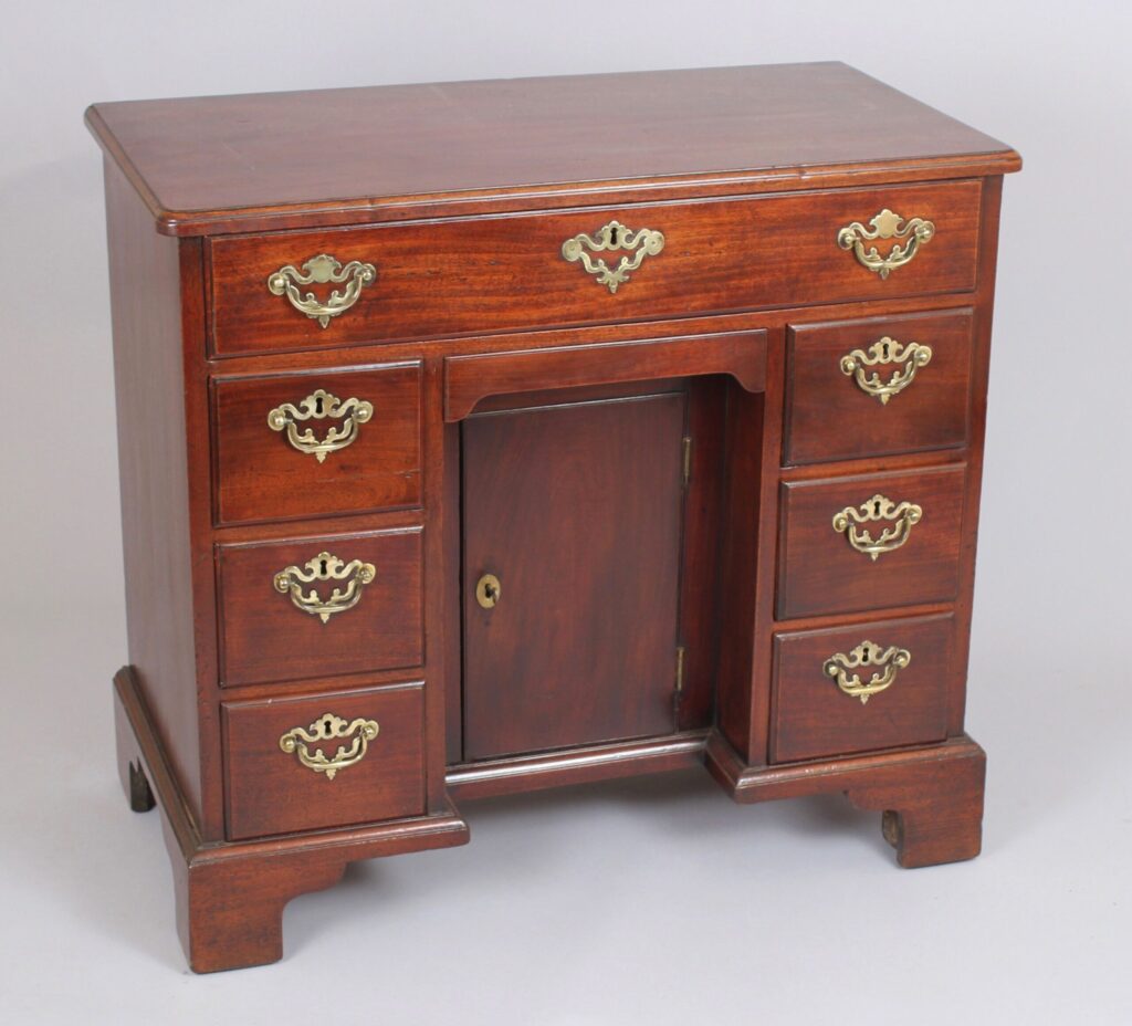 George II period mahogany kneehole dressing-table by Elizabeth Bell of London