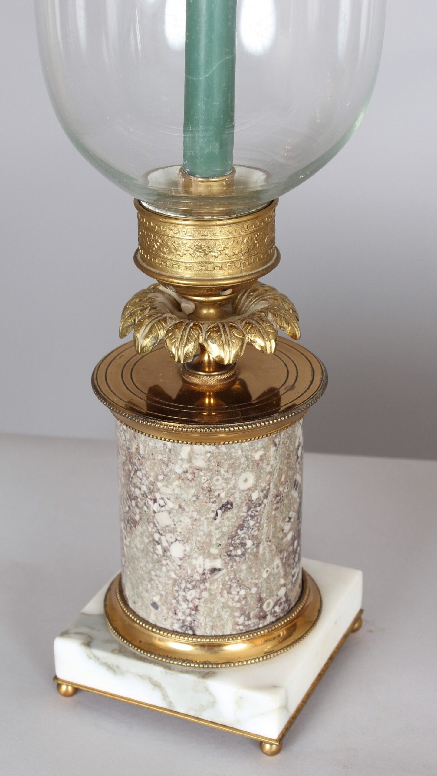 Very fine pair of early nineteenth century French ormolu and fossil marble table candlesticks with storm-shades