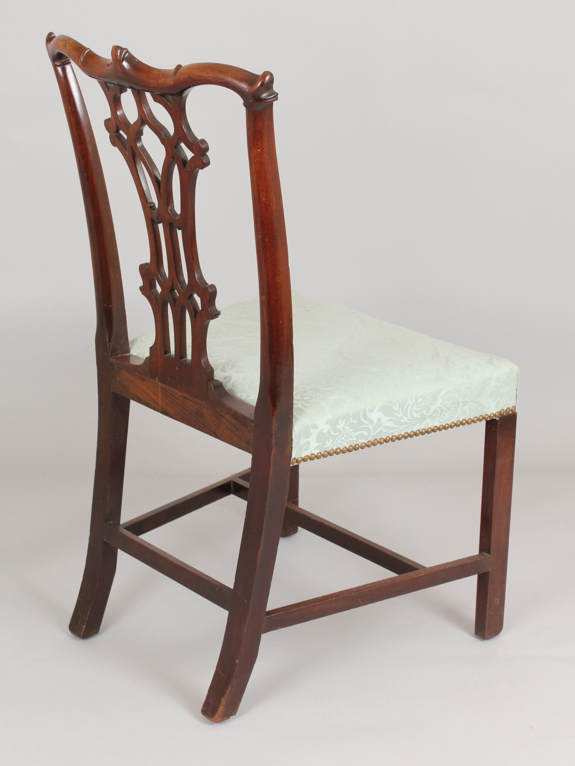 A fine pair of George III period mahogany side-chairs in the Chippendale manner