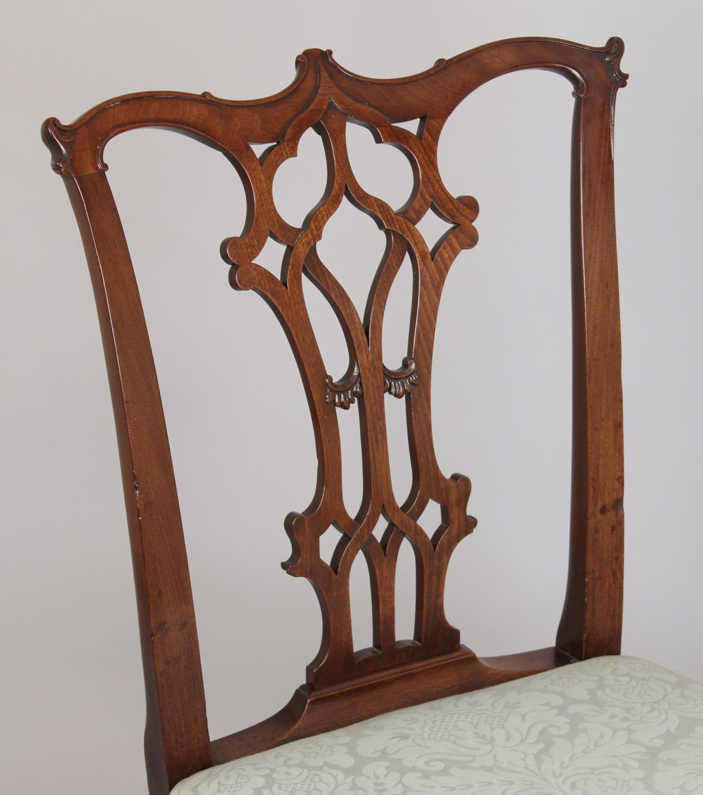 A fine pair of George III period mahogany side-chairs in the Chippendale manner
