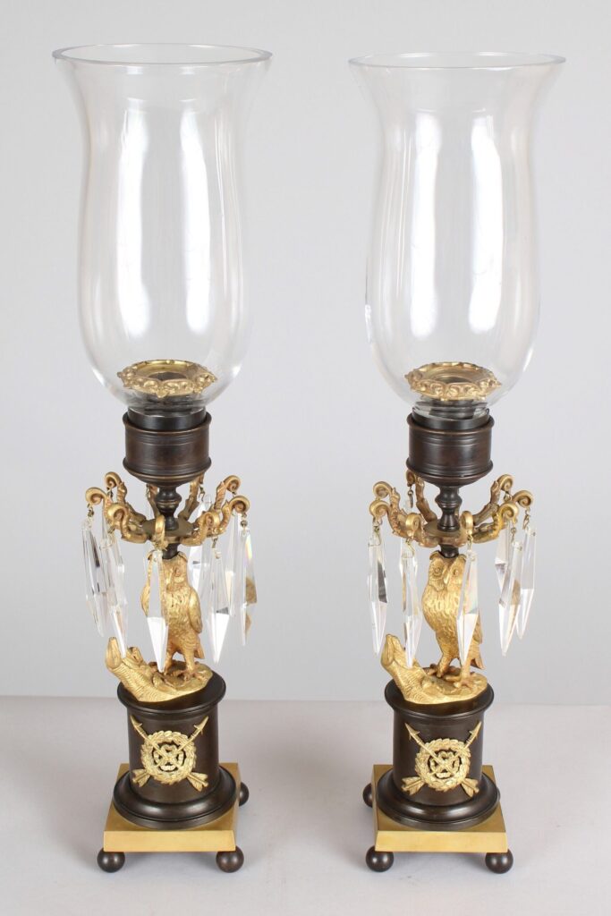 Pair of Regency period bronze and ormolu owl candlesticks/storm lights