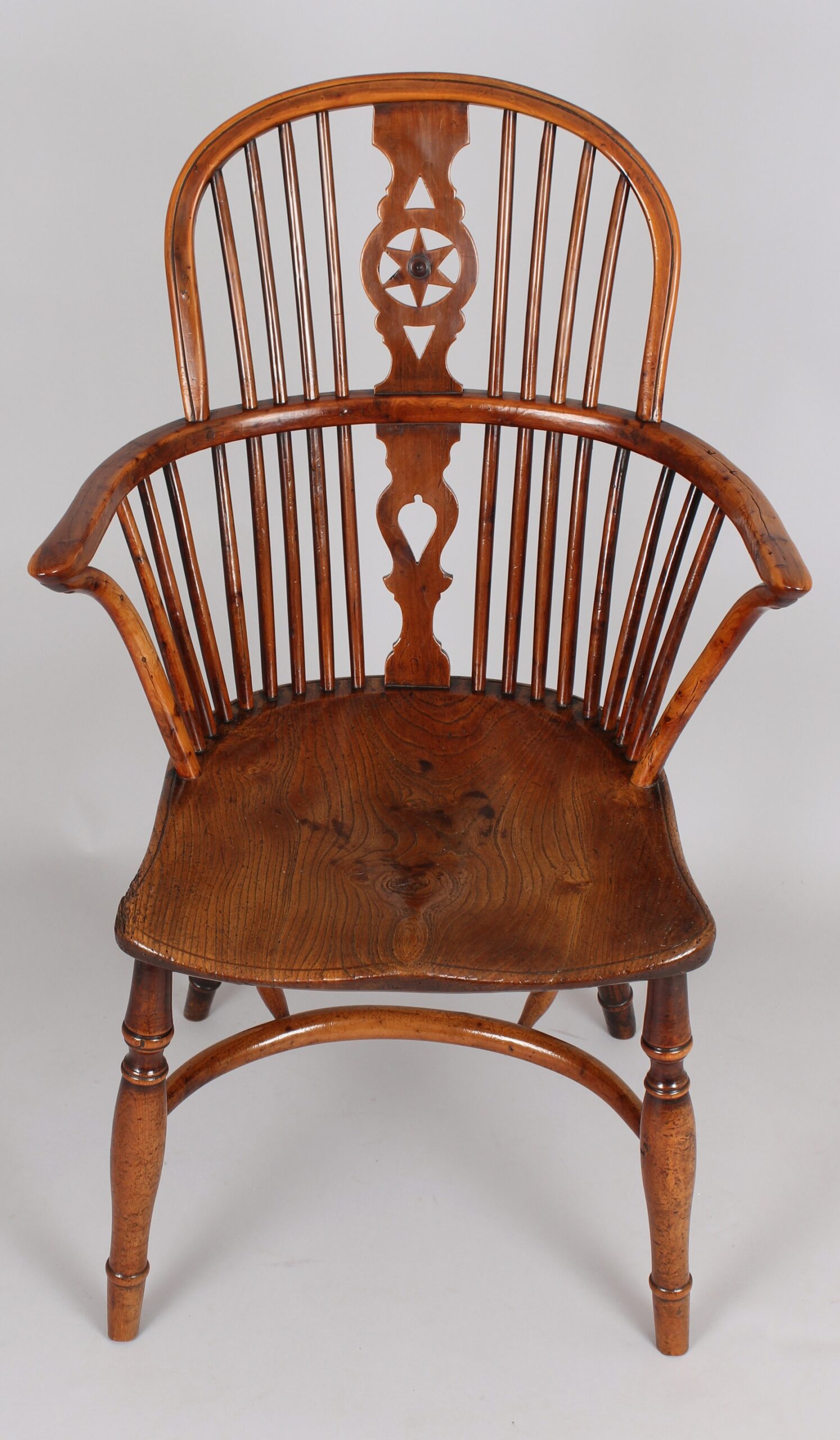 Fine Yew wood Windsor “star” back arm-chair