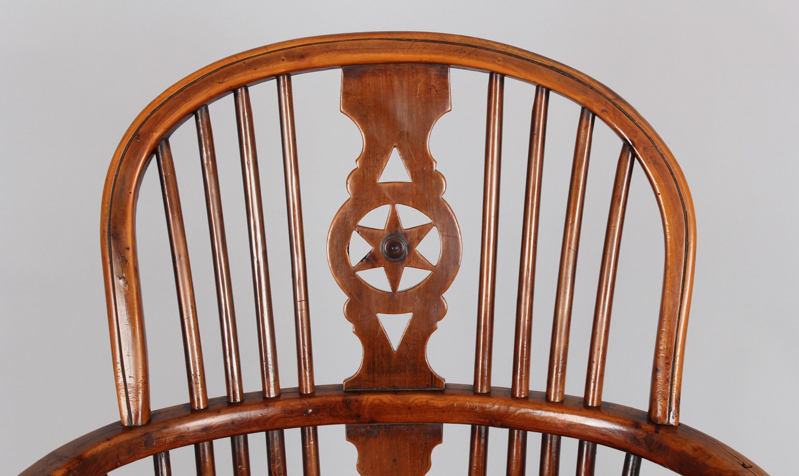 Fine Yew wood Windsor “star” back arm-chair