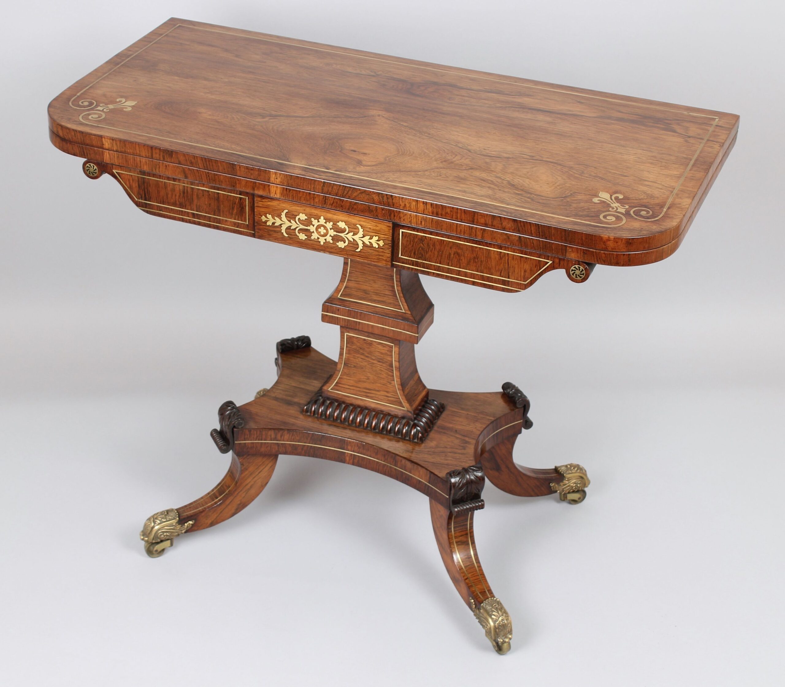 Fine quality Regency rosewood and brass inlaid card-table of mellow golden colour