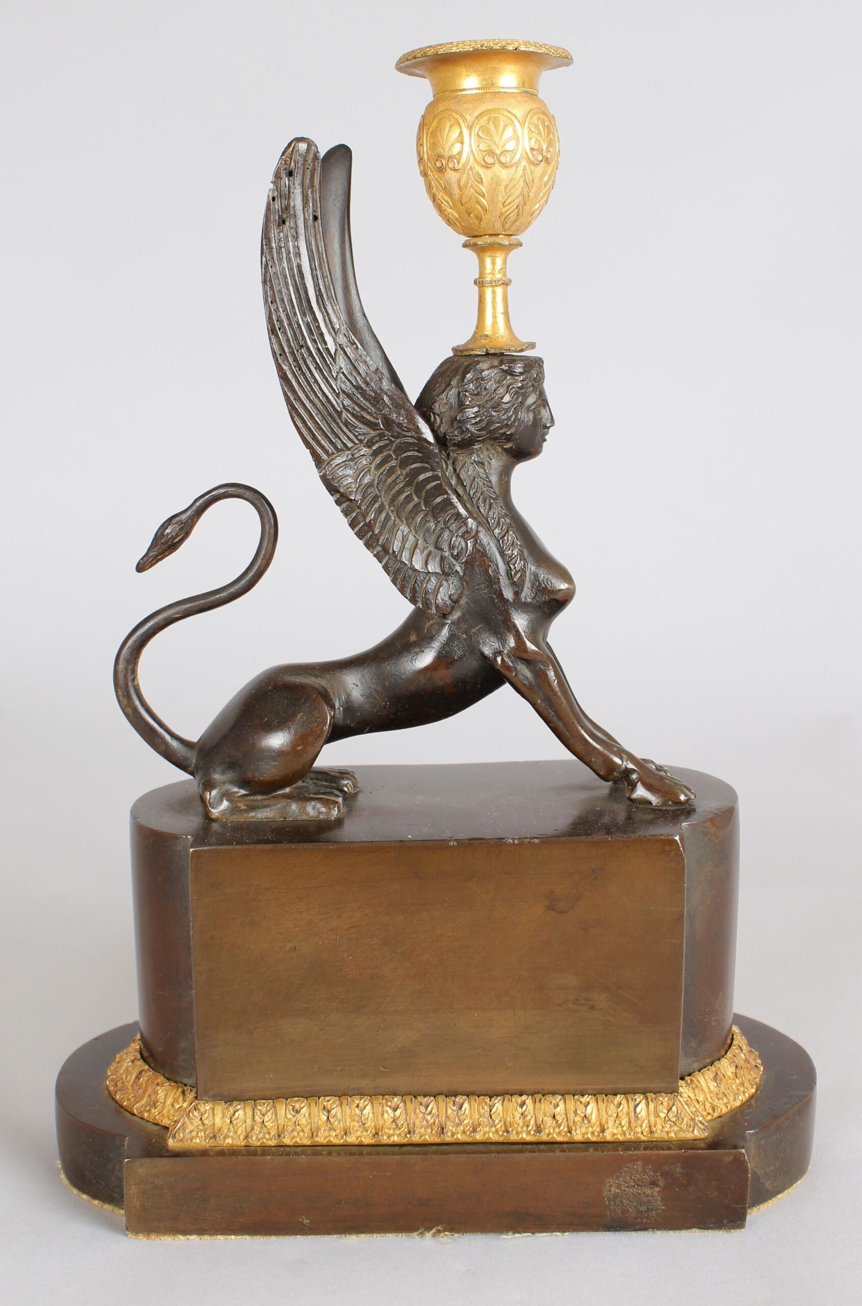 Pair of fine early nineteenth century bronze and ormolu Griffin candlesticks