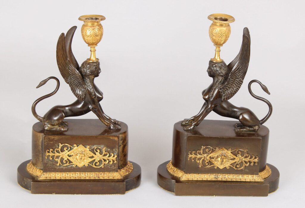 Pair of fine early nineteenth century bronze and ormolu Griffin candlesticks
