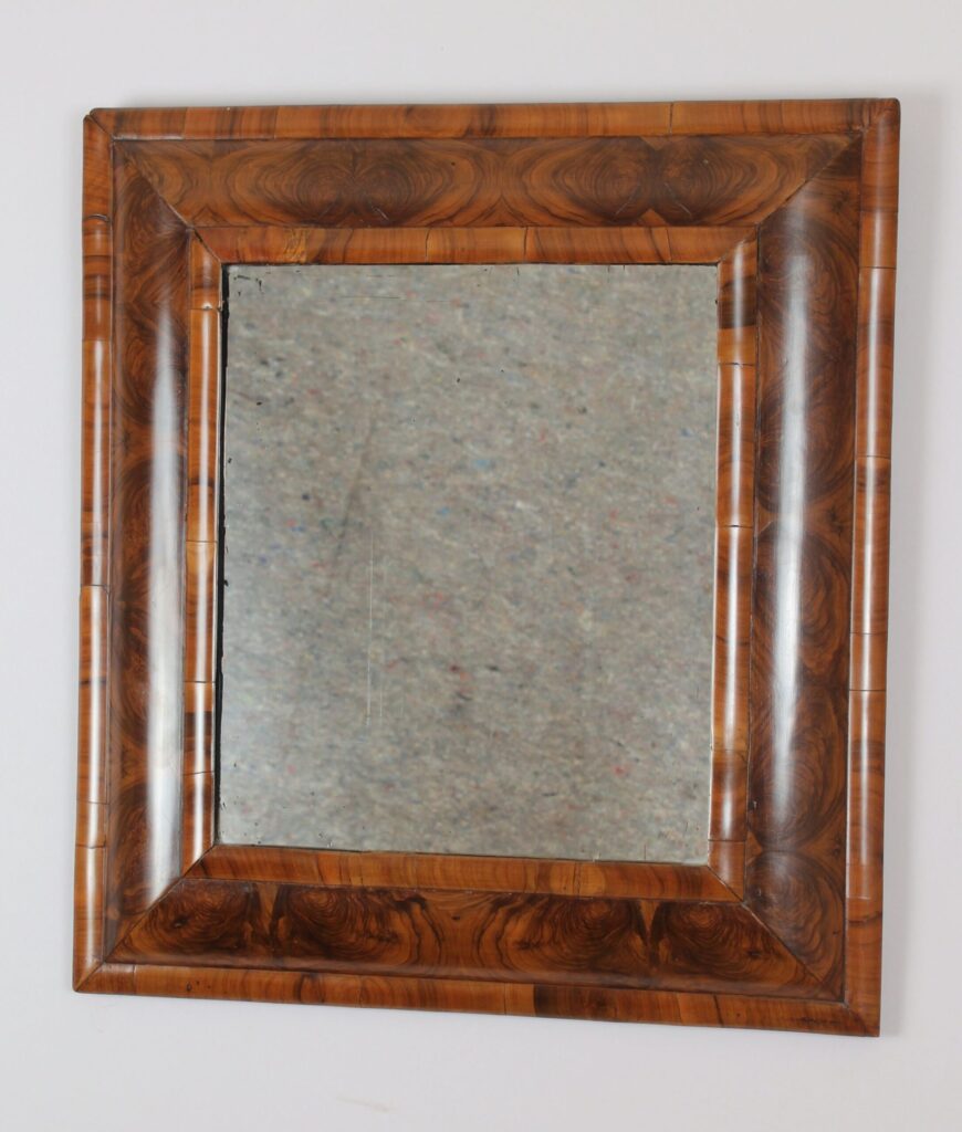 William and Mary period walnut oyster-piece mirror