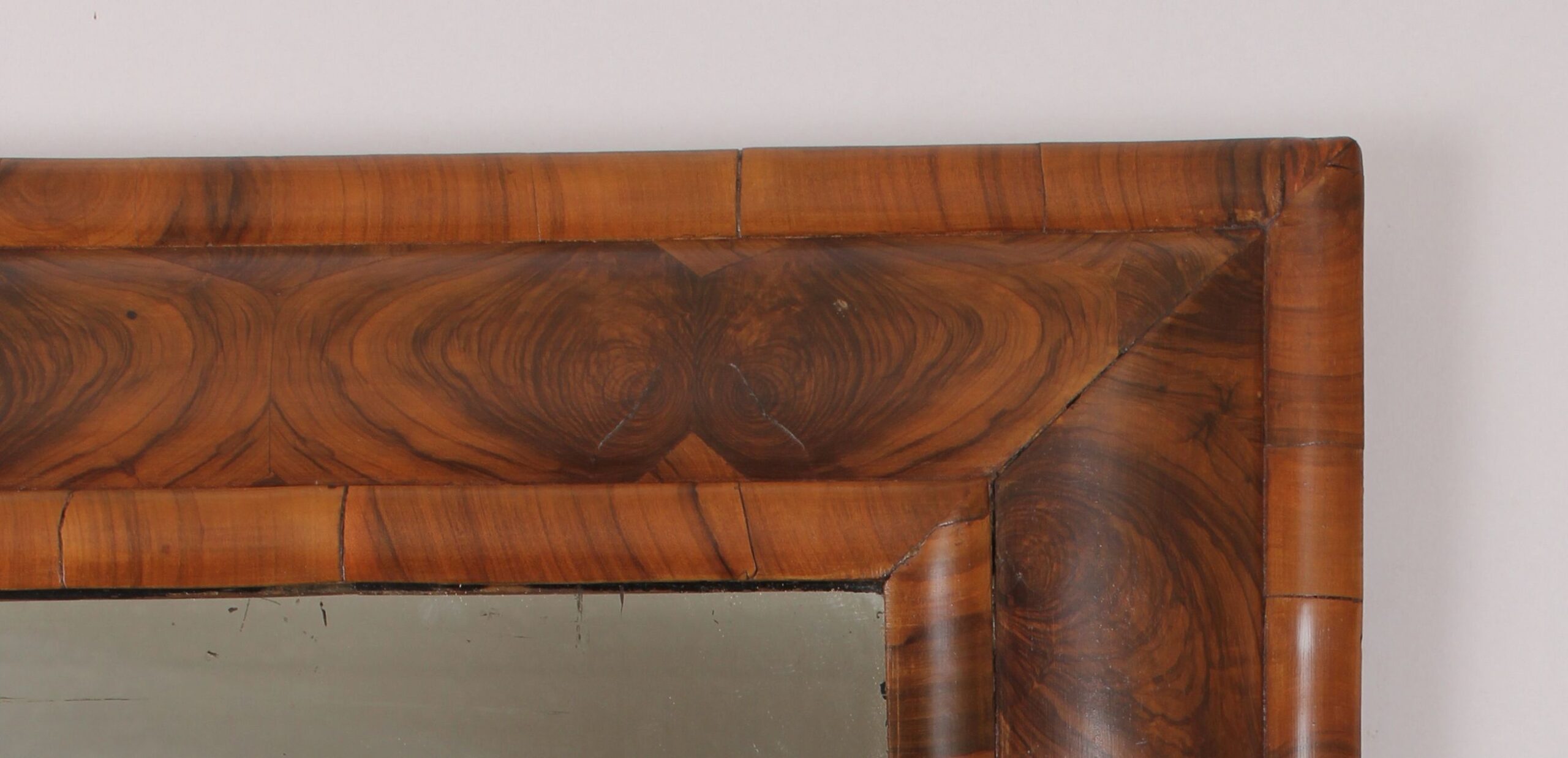 William and Mary period walnut oyster-piece mirror