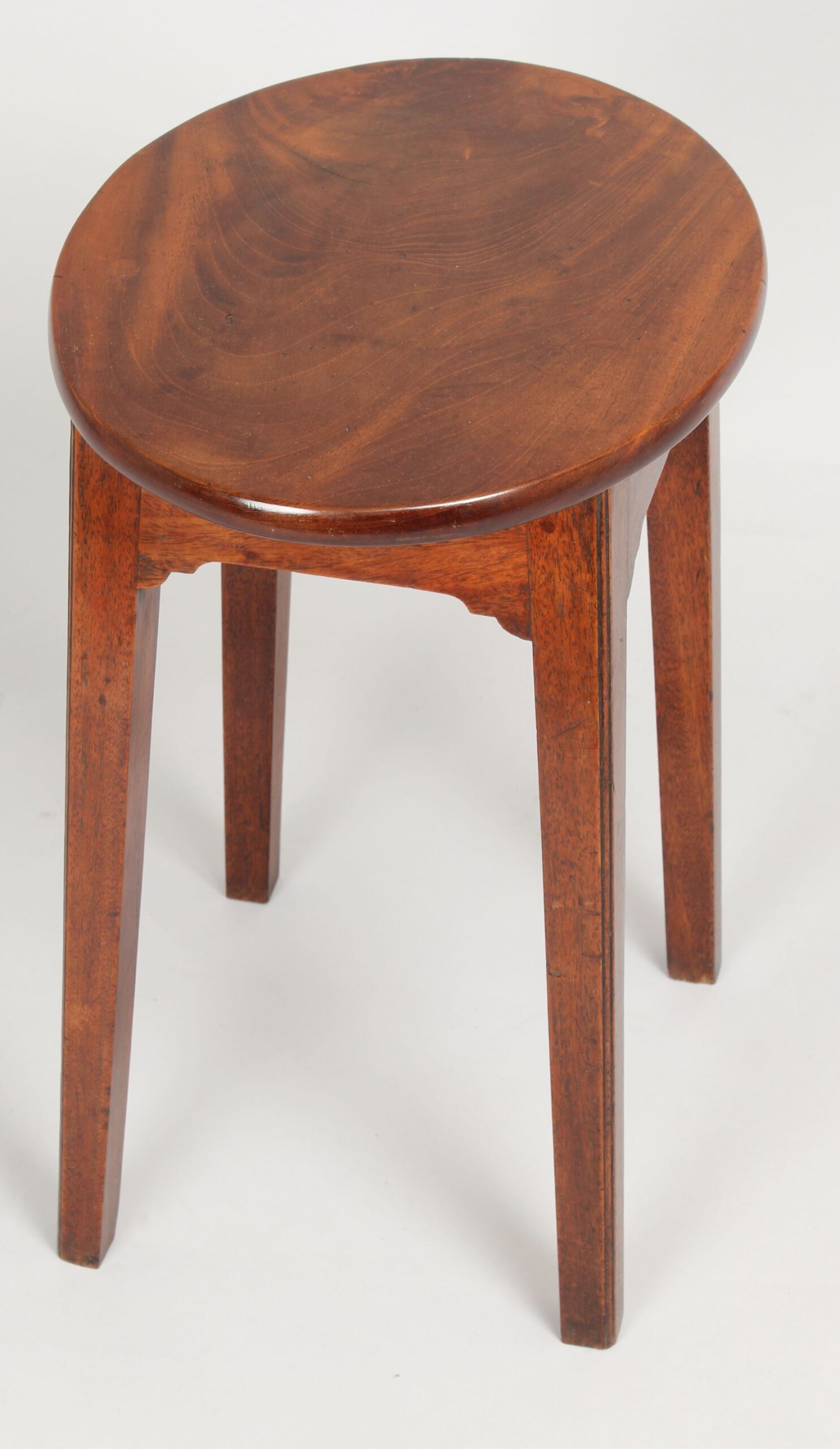 A simple George III period mahogany stool