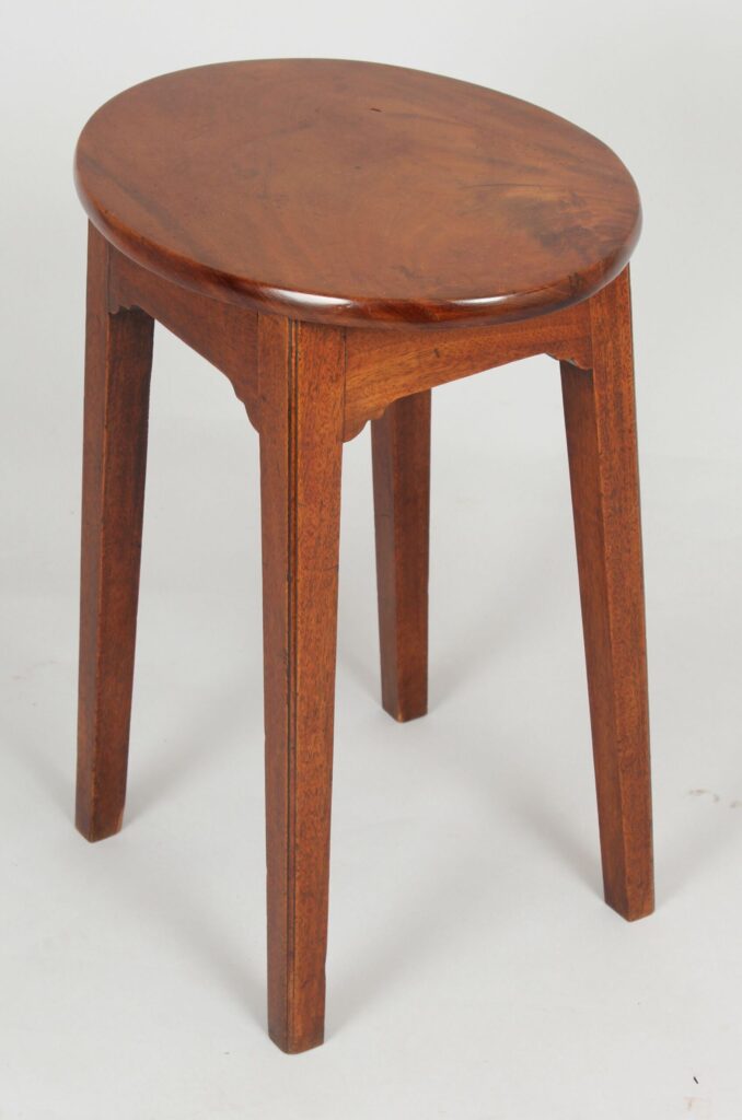 A simple George III period mahogany stool