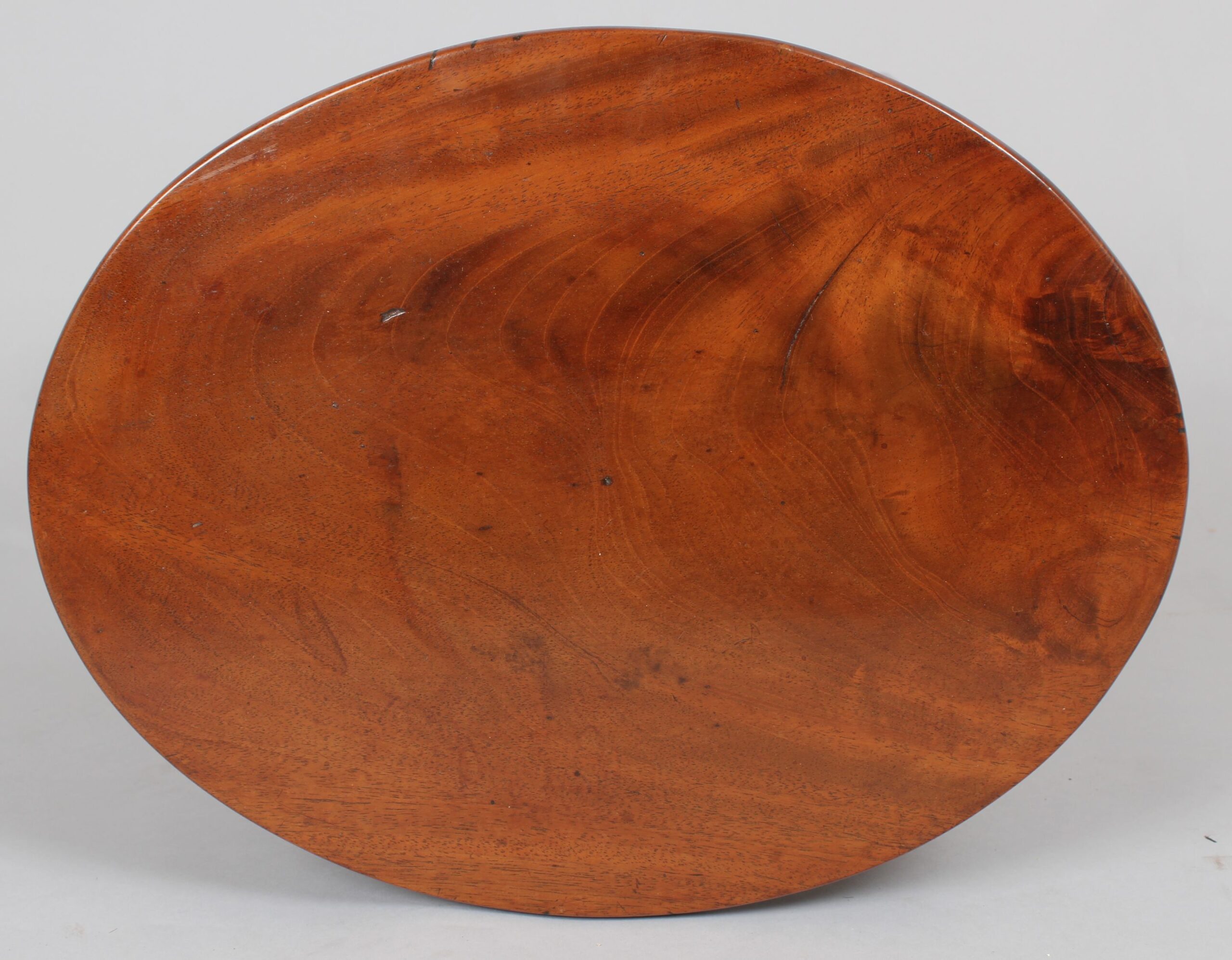A simple George III period mahogany stool