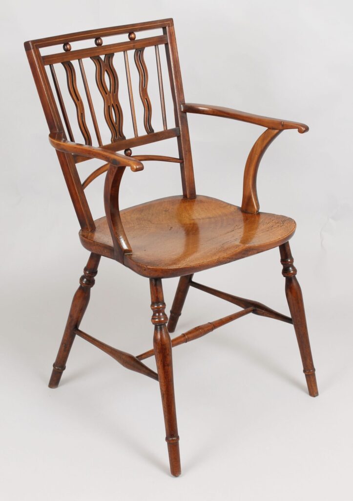 Early 19th century fruitwood Mendlesham Windsor arm-chair
