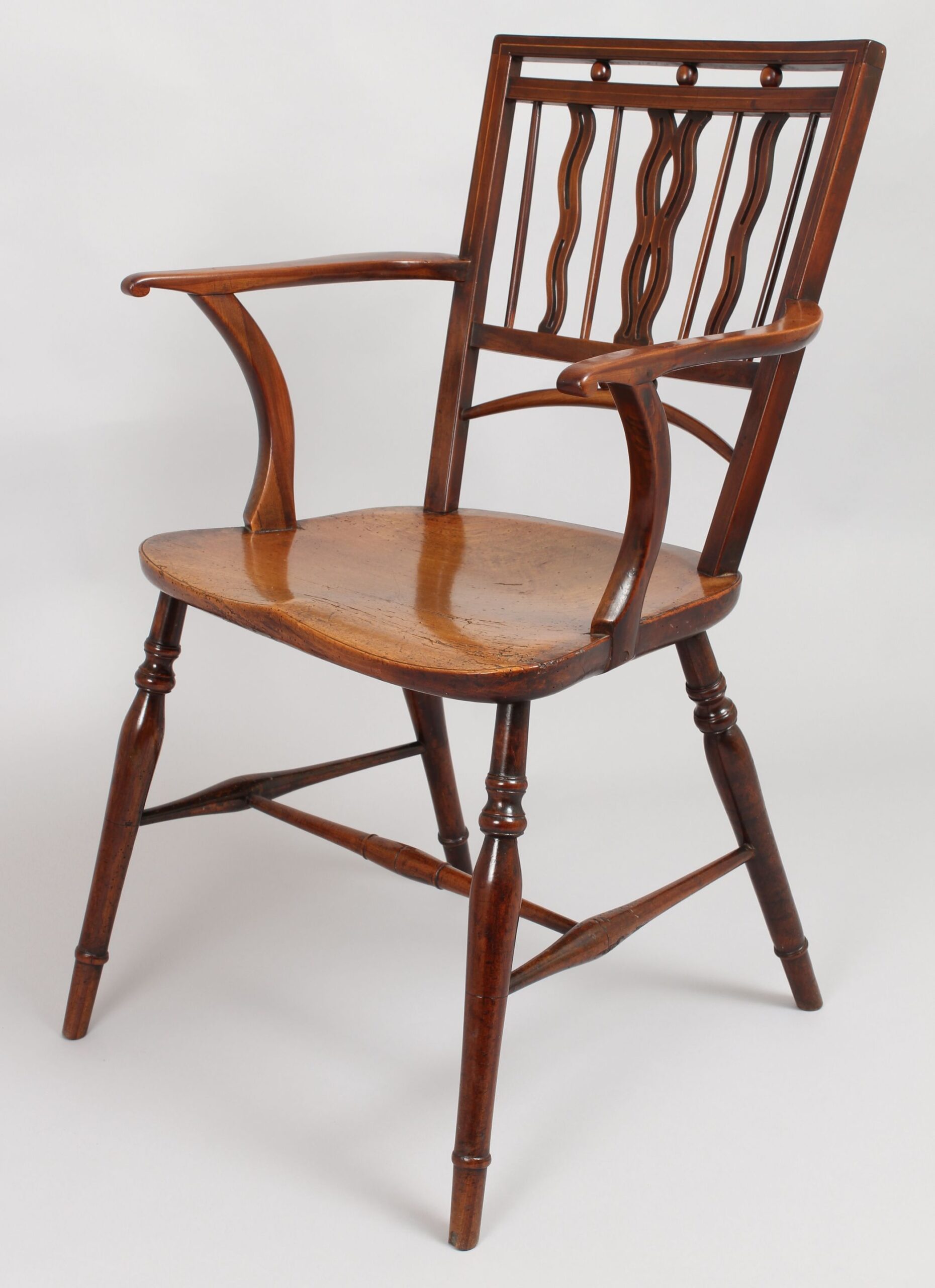 Early 19th century fruitwood Mendlesham Windsor arm-chair