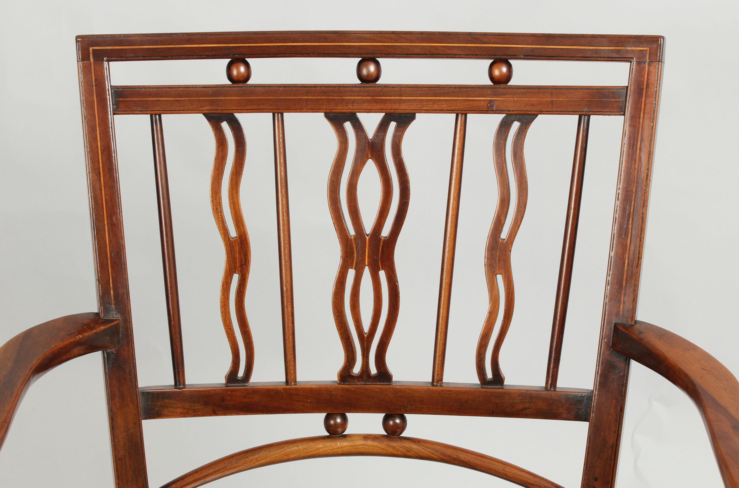Early 19th century fruitwood Mendlesham Windsor arm-chair