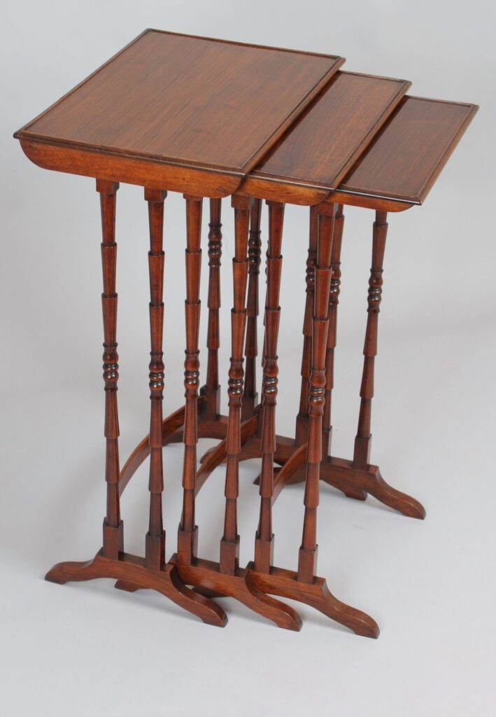 Nest of three tables in rosewood