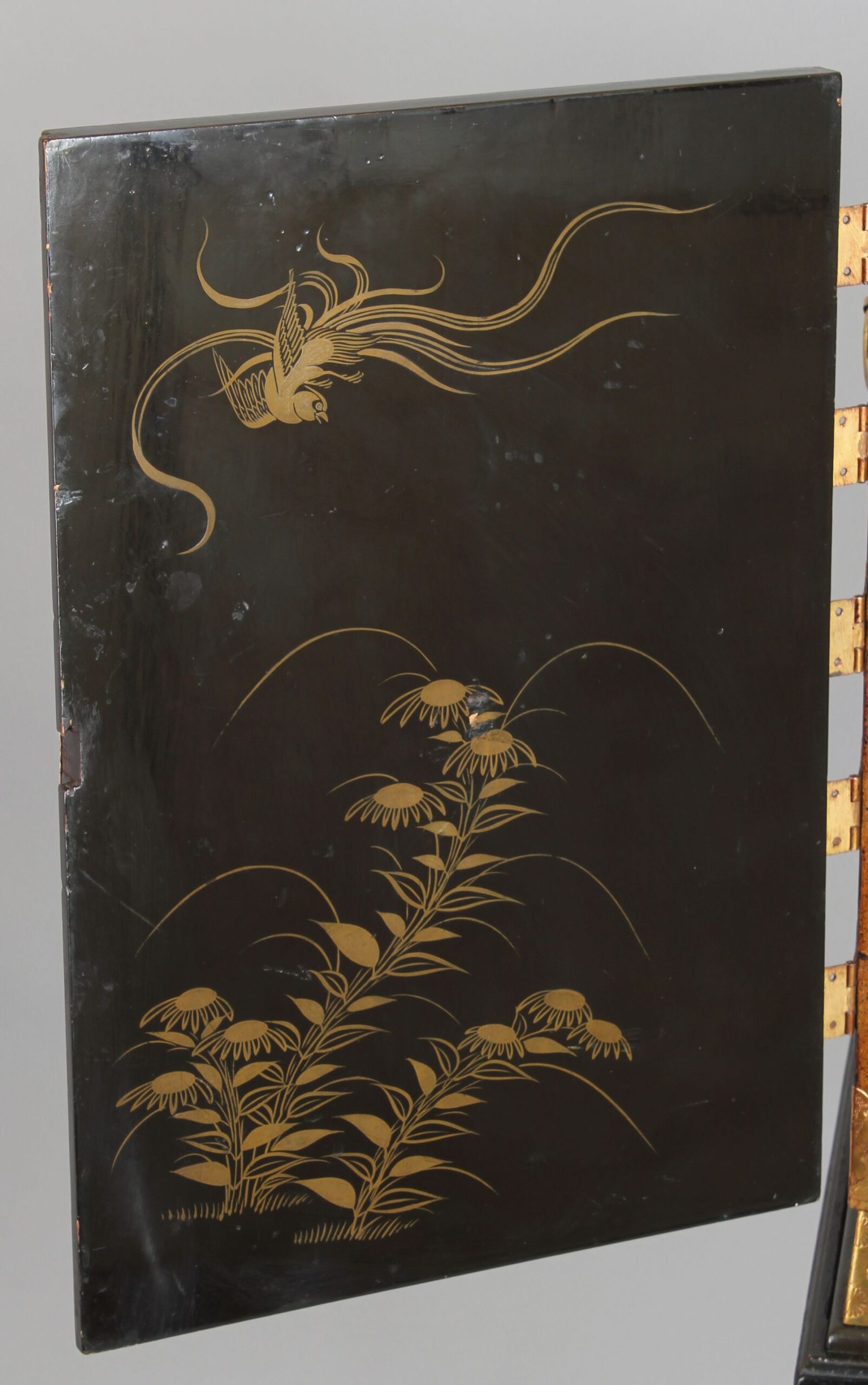 An eighteenth/nineteenth century Japanese lacquered table cabinet