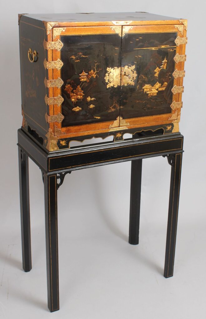 An eighteenth/nineteenth century Japanese lacquered table cabinet