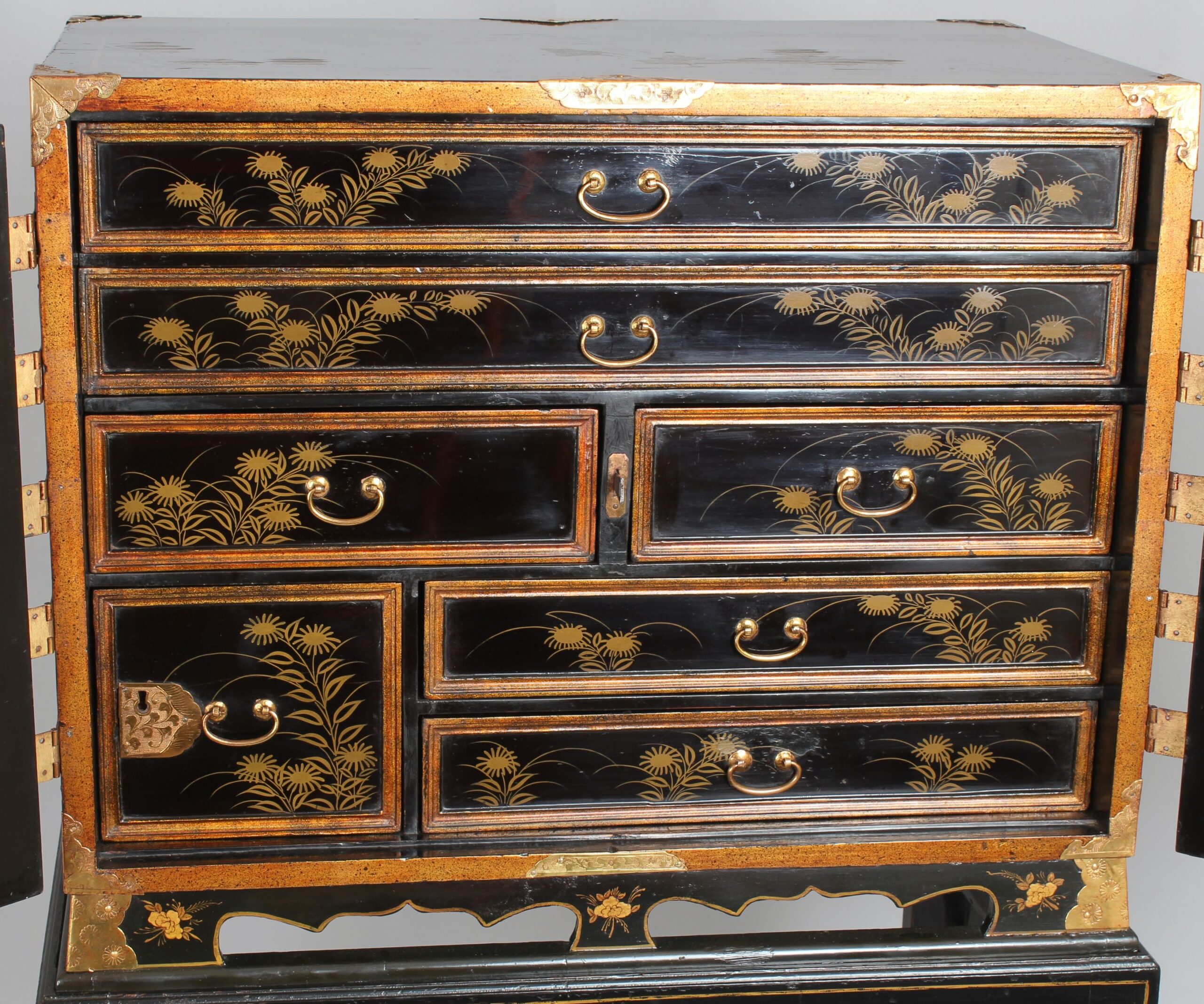 An eighteenth/nineteenth century Japanese lacquered table cabinet