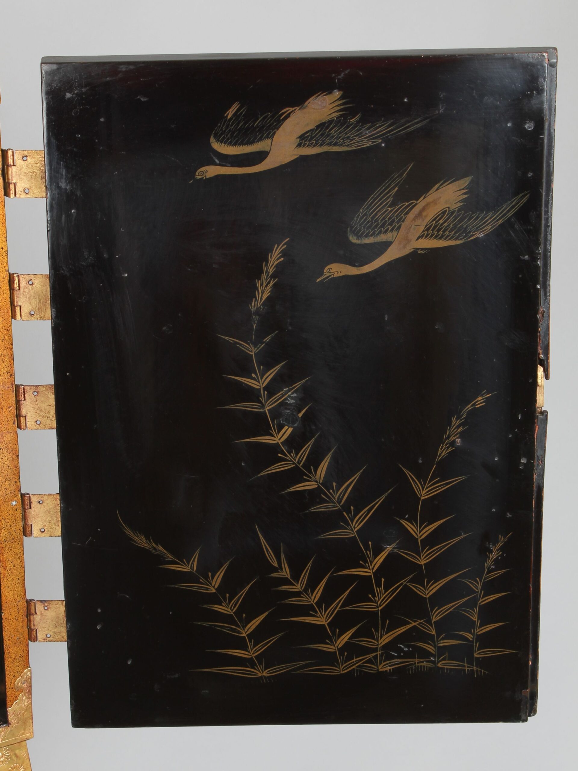 An eighteenth/nineteenth century Japanese lacquered table cabinet