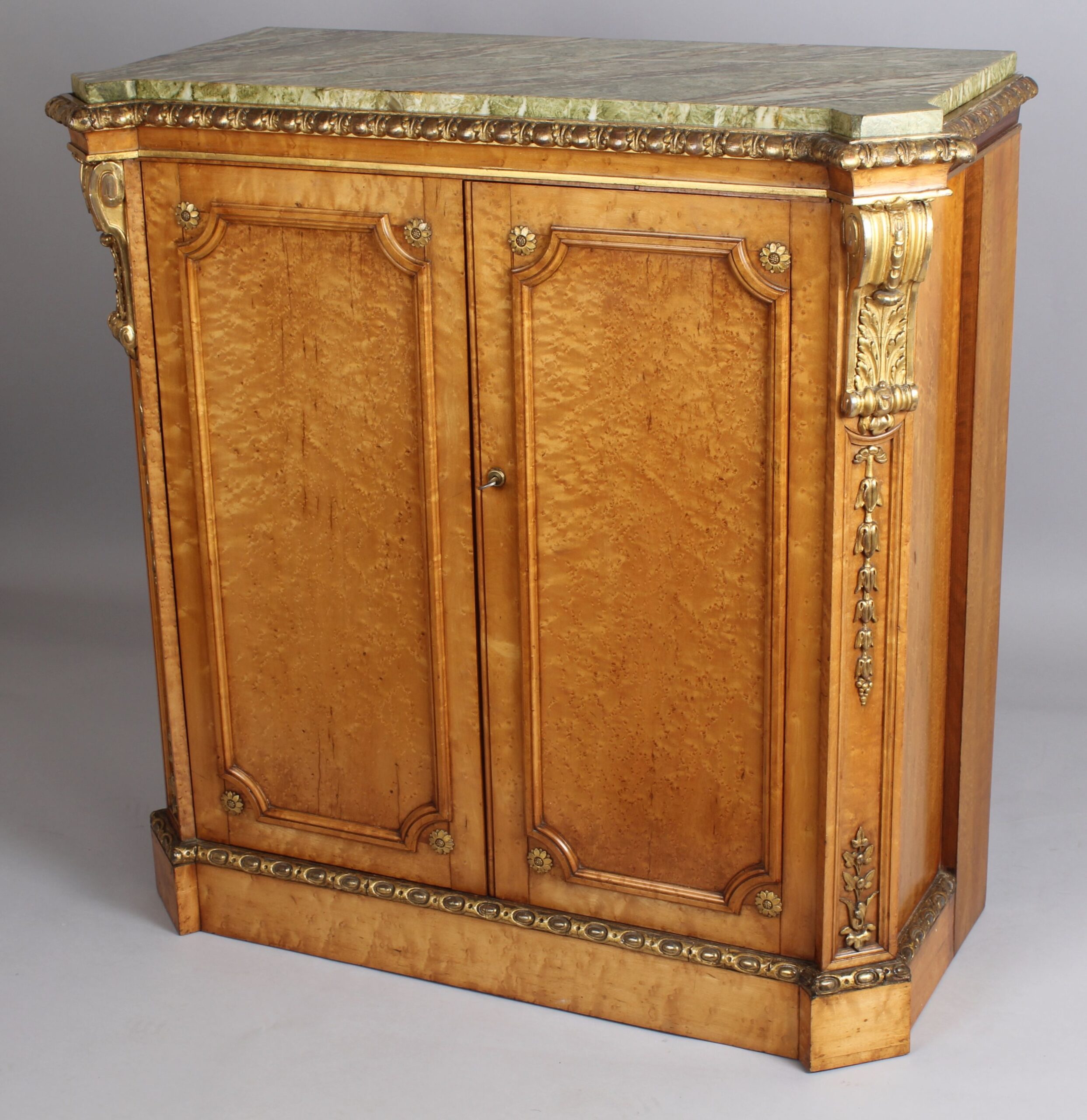 Fine pair side-cabinets in the manner of Holland & Sons