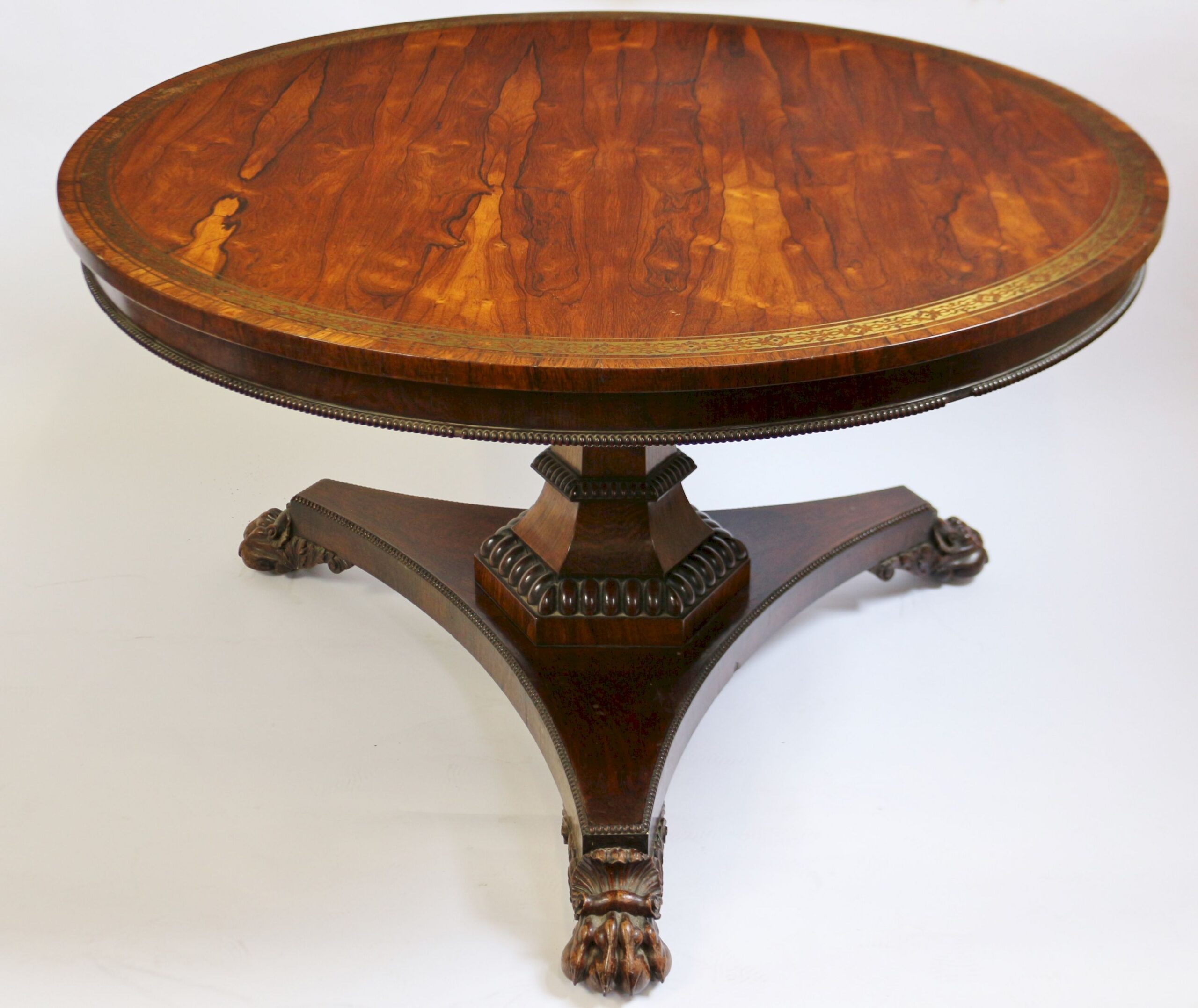 Fine and classic Regency rosewood pedestal table