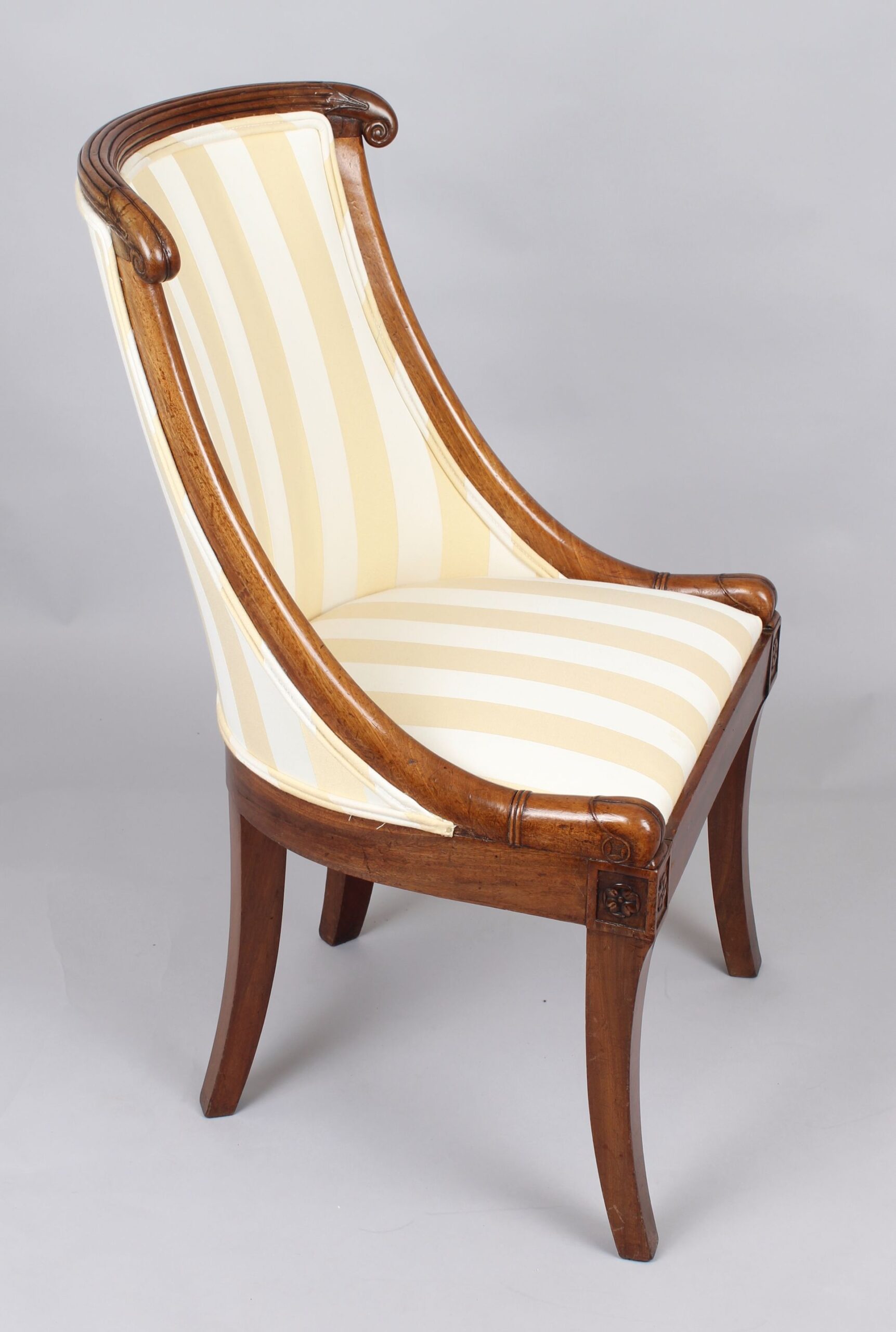 Pair of early 19th century French mahogany small bergeres