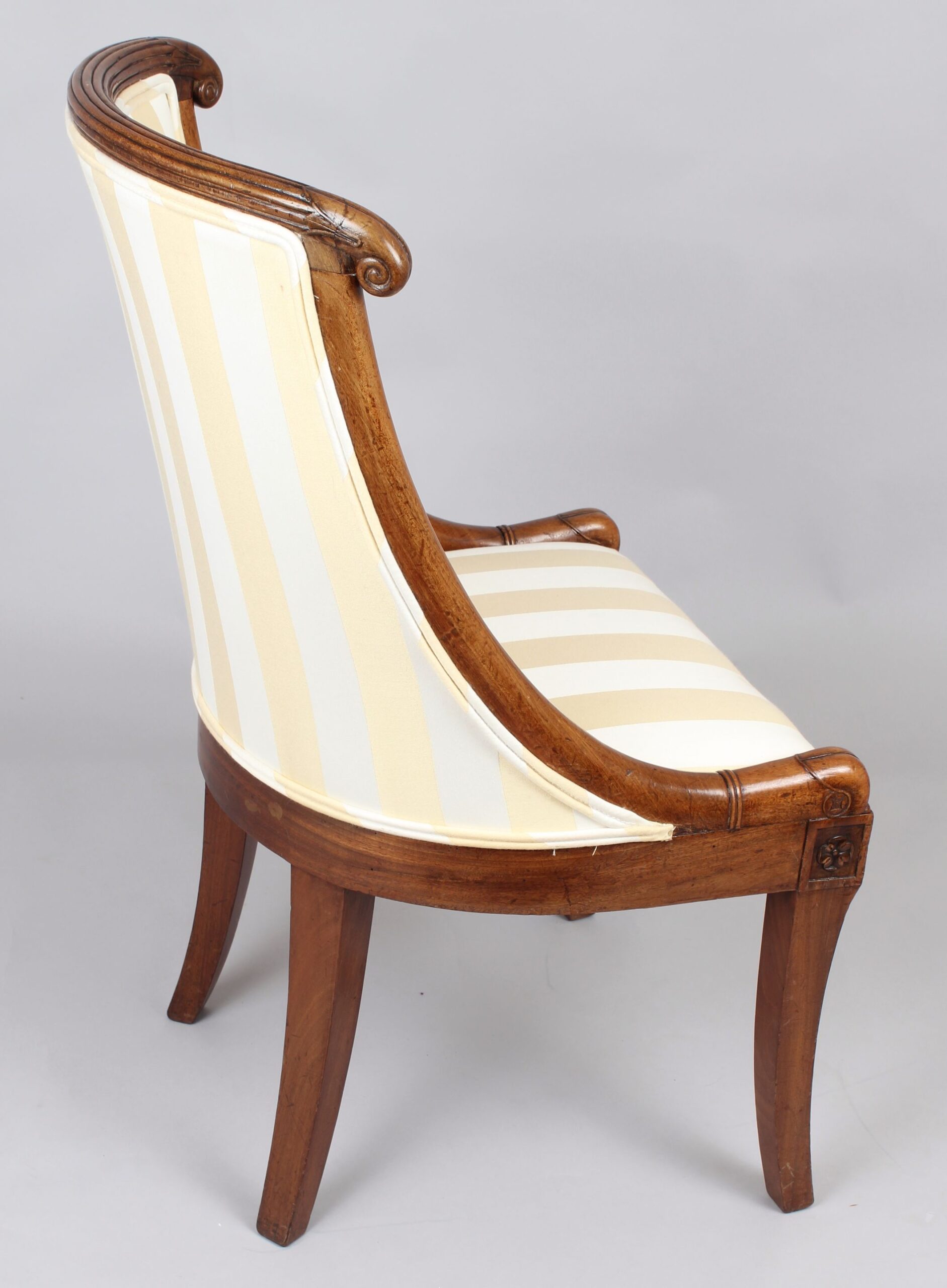 Pair of early 19th century French mahogany small bergeres