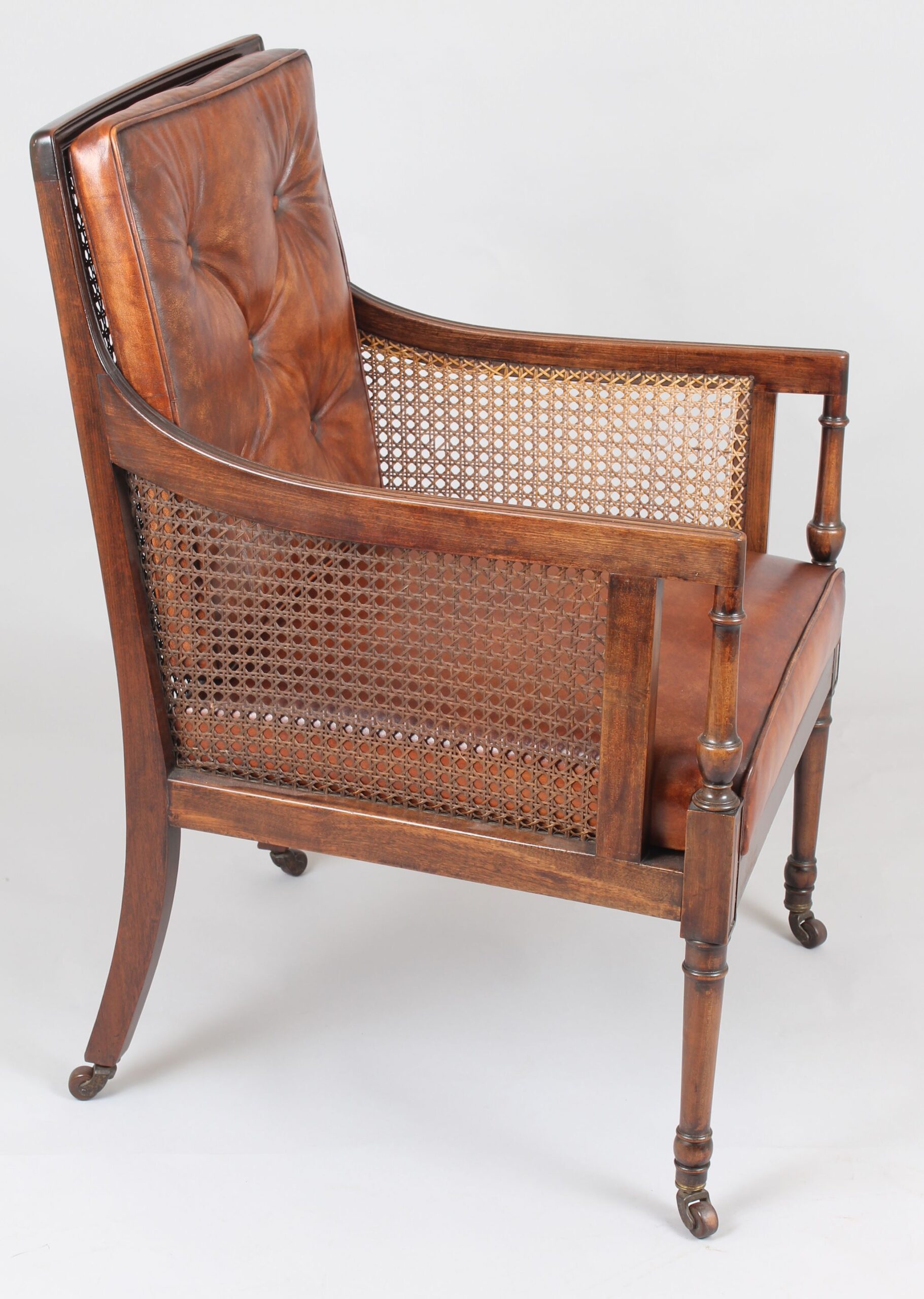 Late nineteenth century mahogany library bergere in the Regency style
