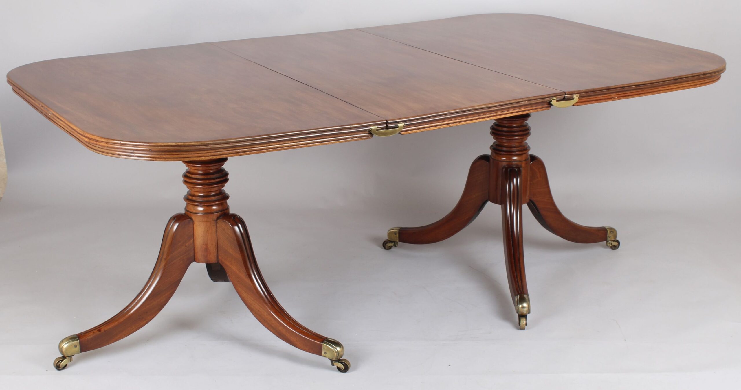 George IV period mahogany twin-pedestal dining-table