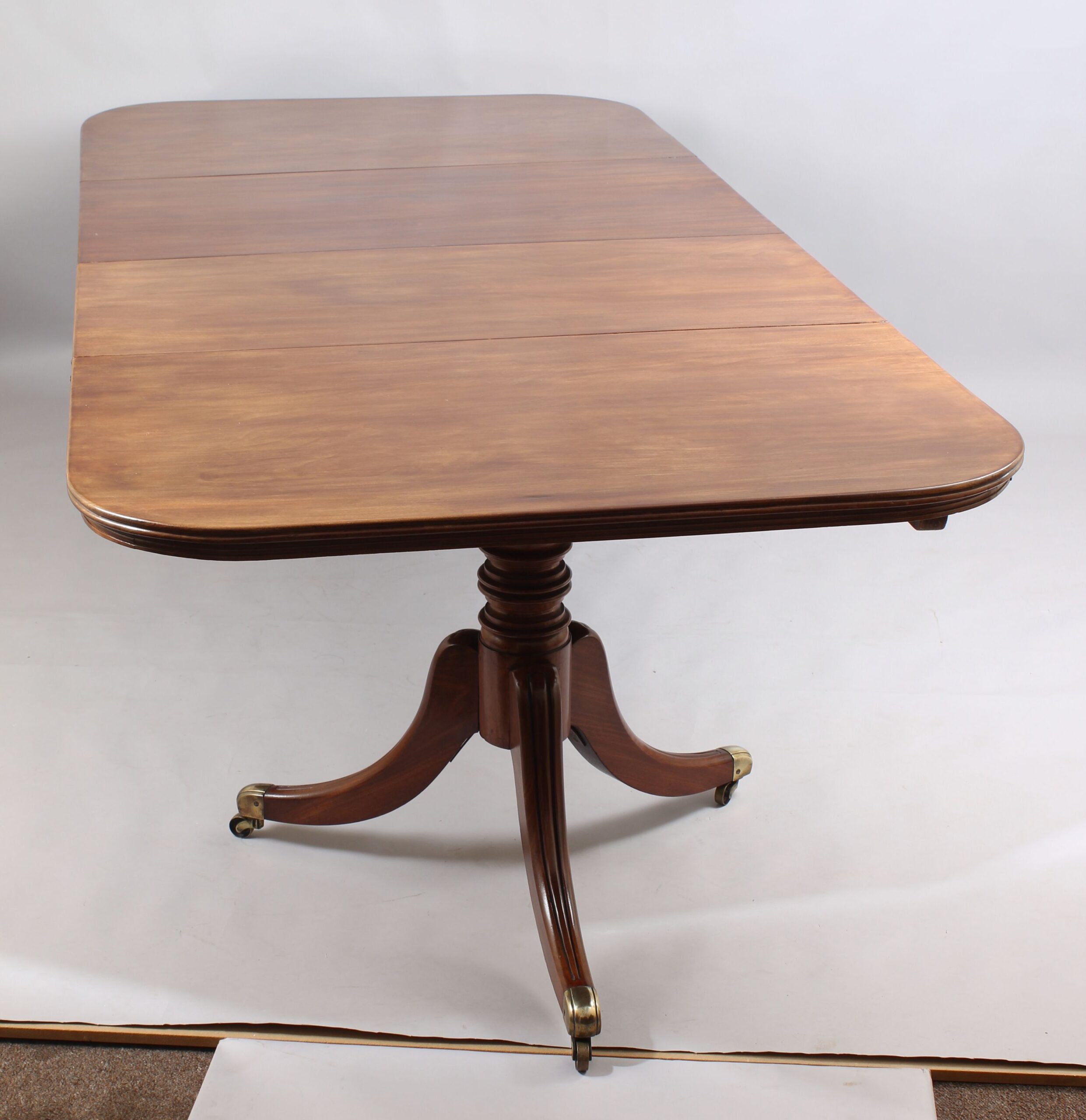 George IV period mahogany twin-pedestal dining-table