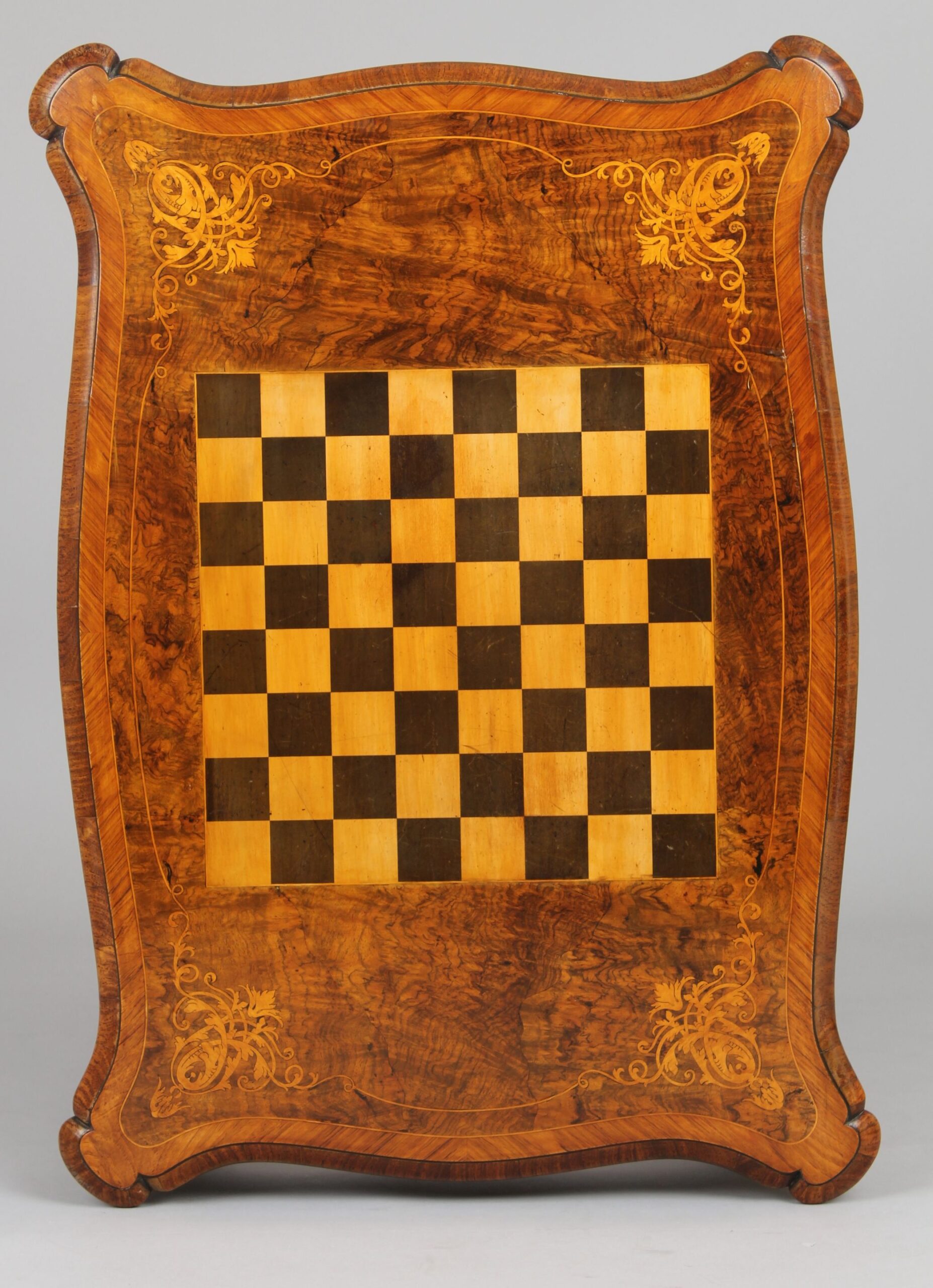Fine quality walnut and ormolu-mounted inlaid games-table in the Louis XV revival style