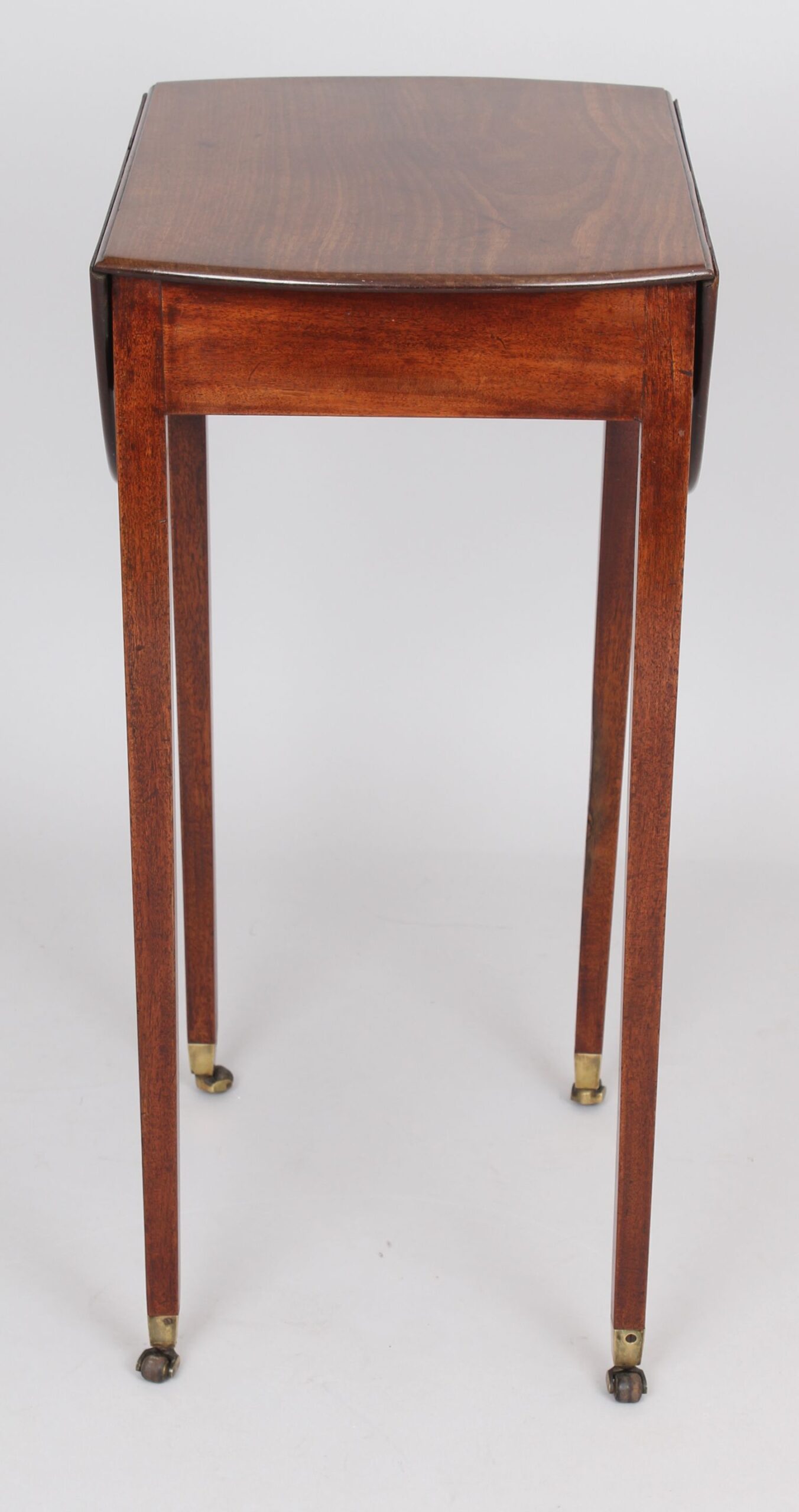 A George III period mahogany small oval Pembroke table