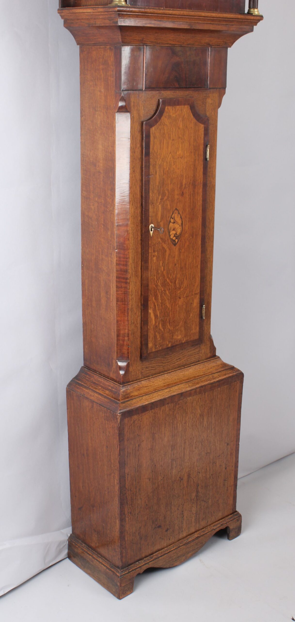 Early nineteenth century golden-oak and mahogany long-case clock