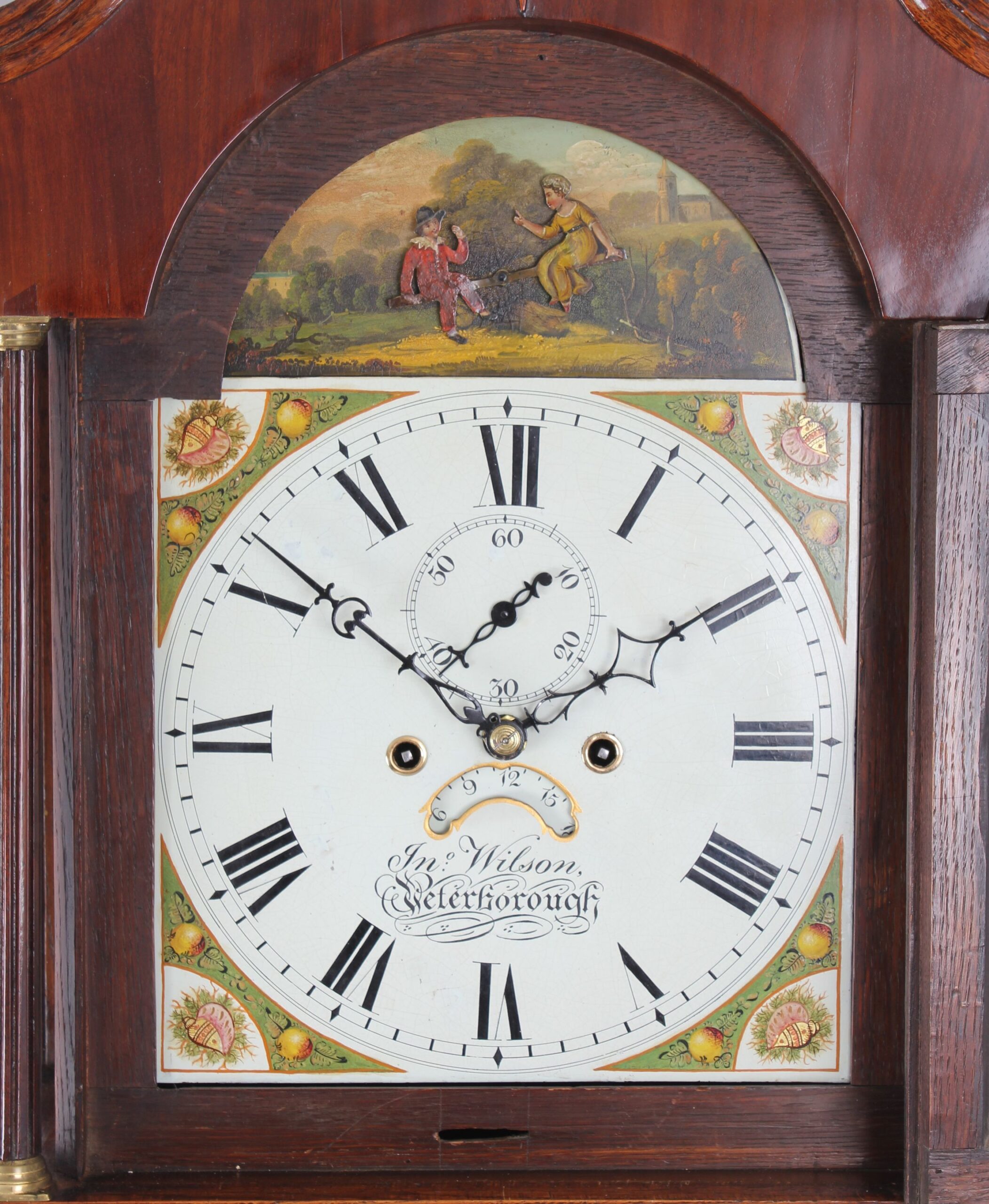 Early nineteenth century golden-oak and mahogany long-case clock