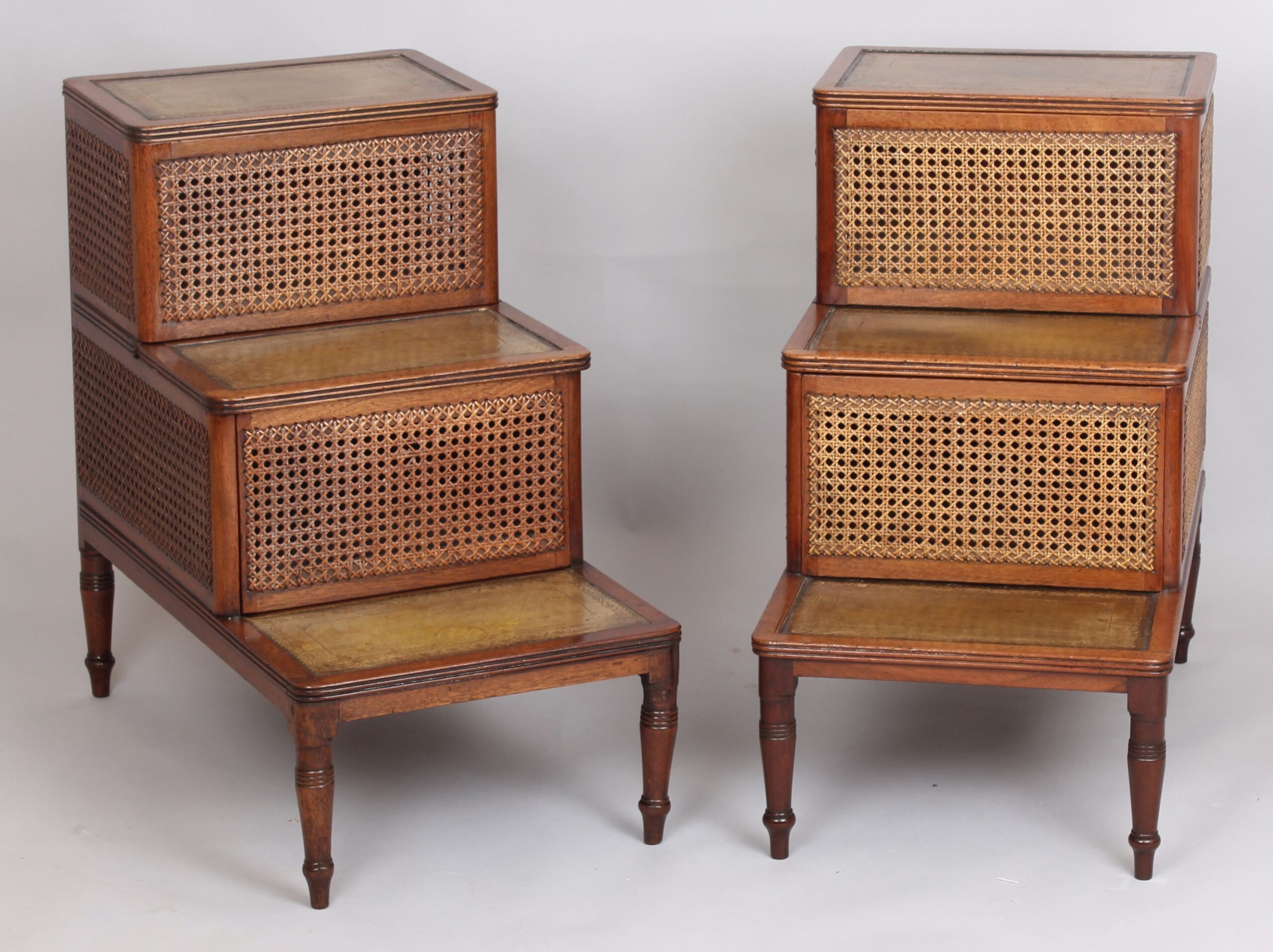 Fine and extremely rare pair of George III period mahogany and cane bed-steps