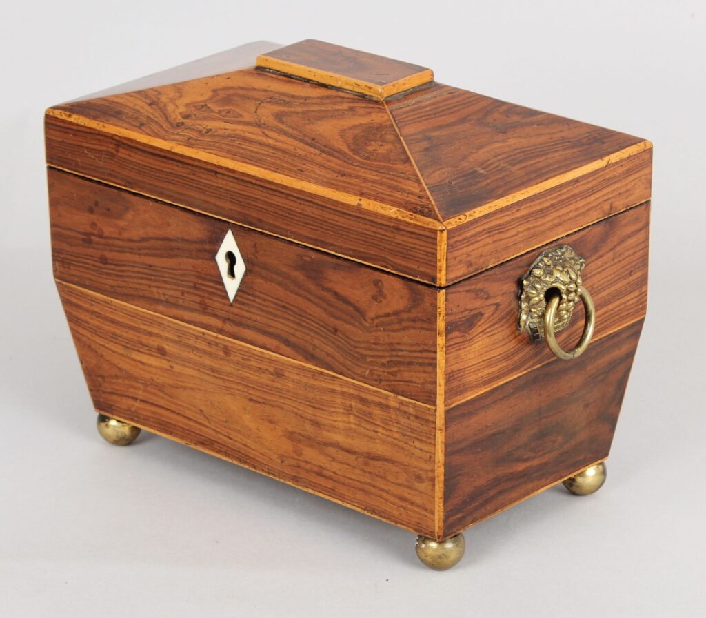 George IV period pale rosewood sarcophagus-shaped tea caddy
