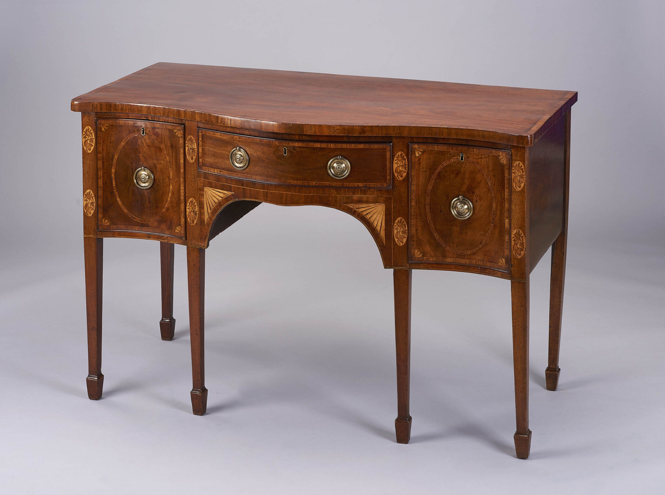 Very fine George III period mahogany serpentine-fronted sideboard