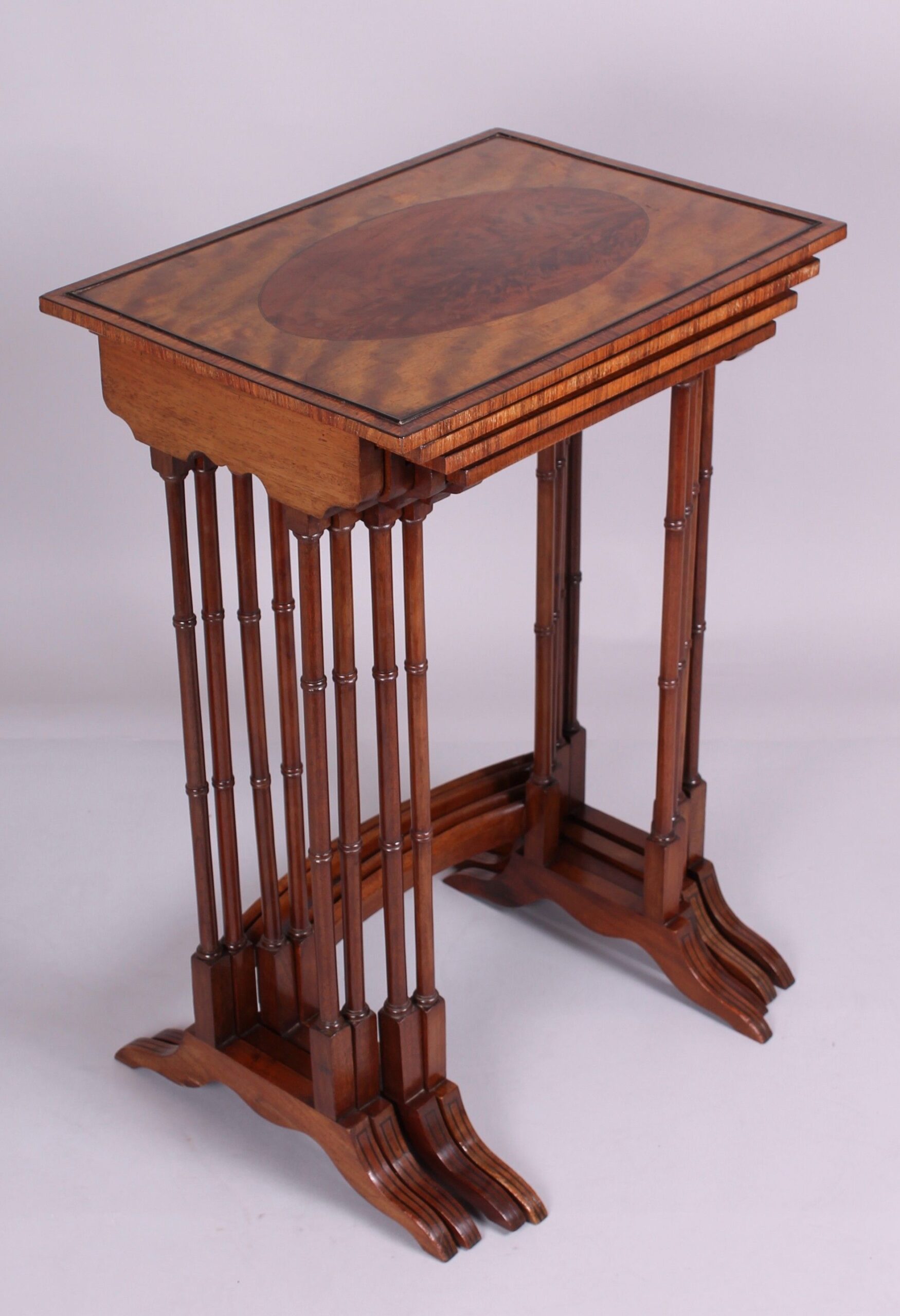 Edwardian Sheraton Revival satinwood and mahogany quartetto tables