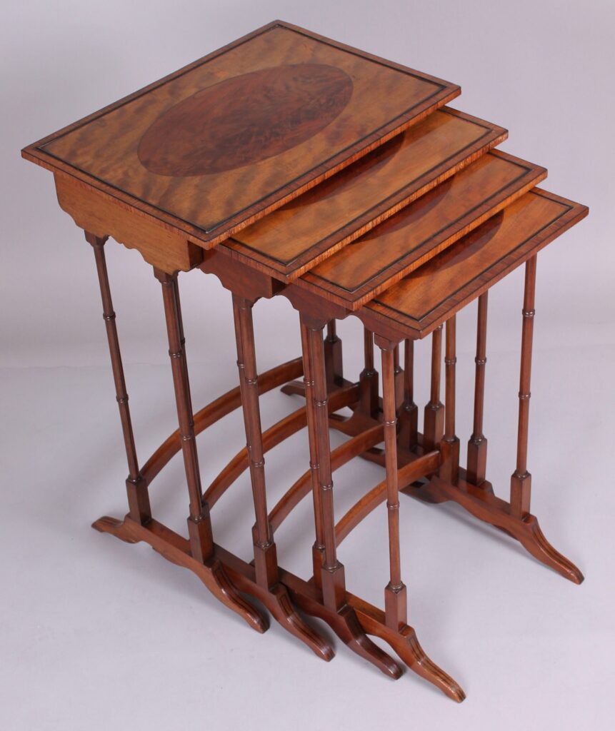 Edwardian Sheraton Revival satinwood and mahogany quartetto tables