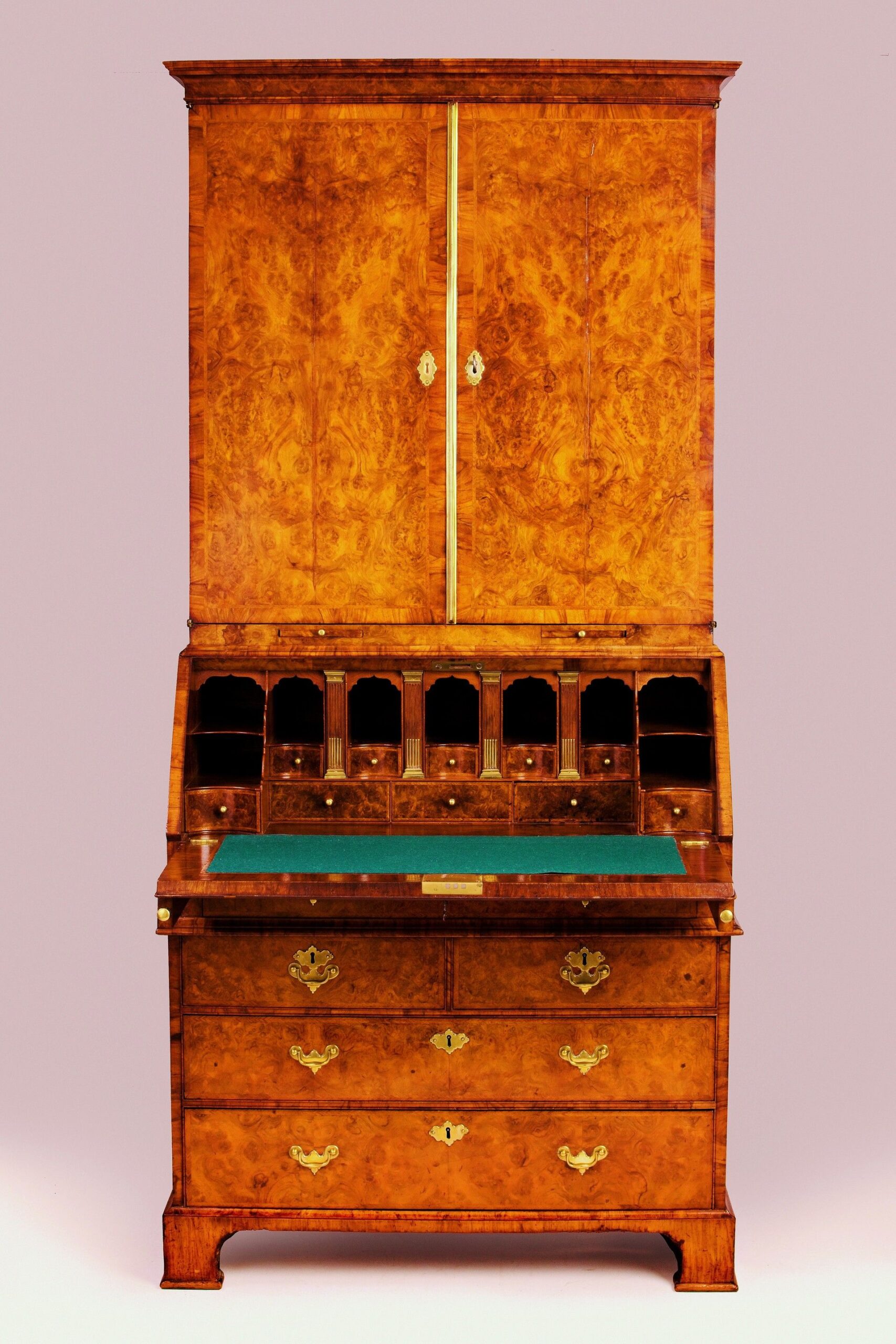 George II period burr walnut bureau-cabinet
