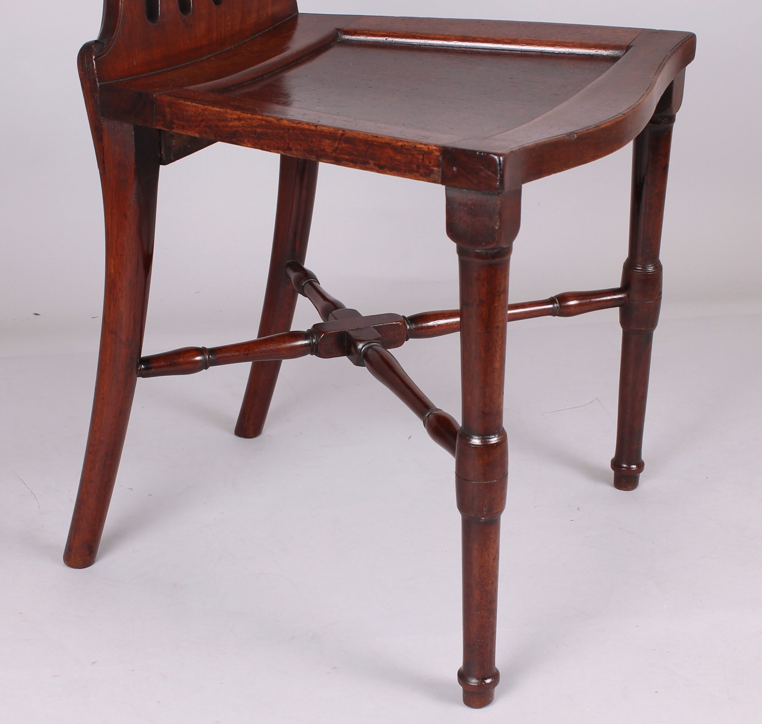 Fine and unusual George III period mahogany ‘medallion-back’ hall chair