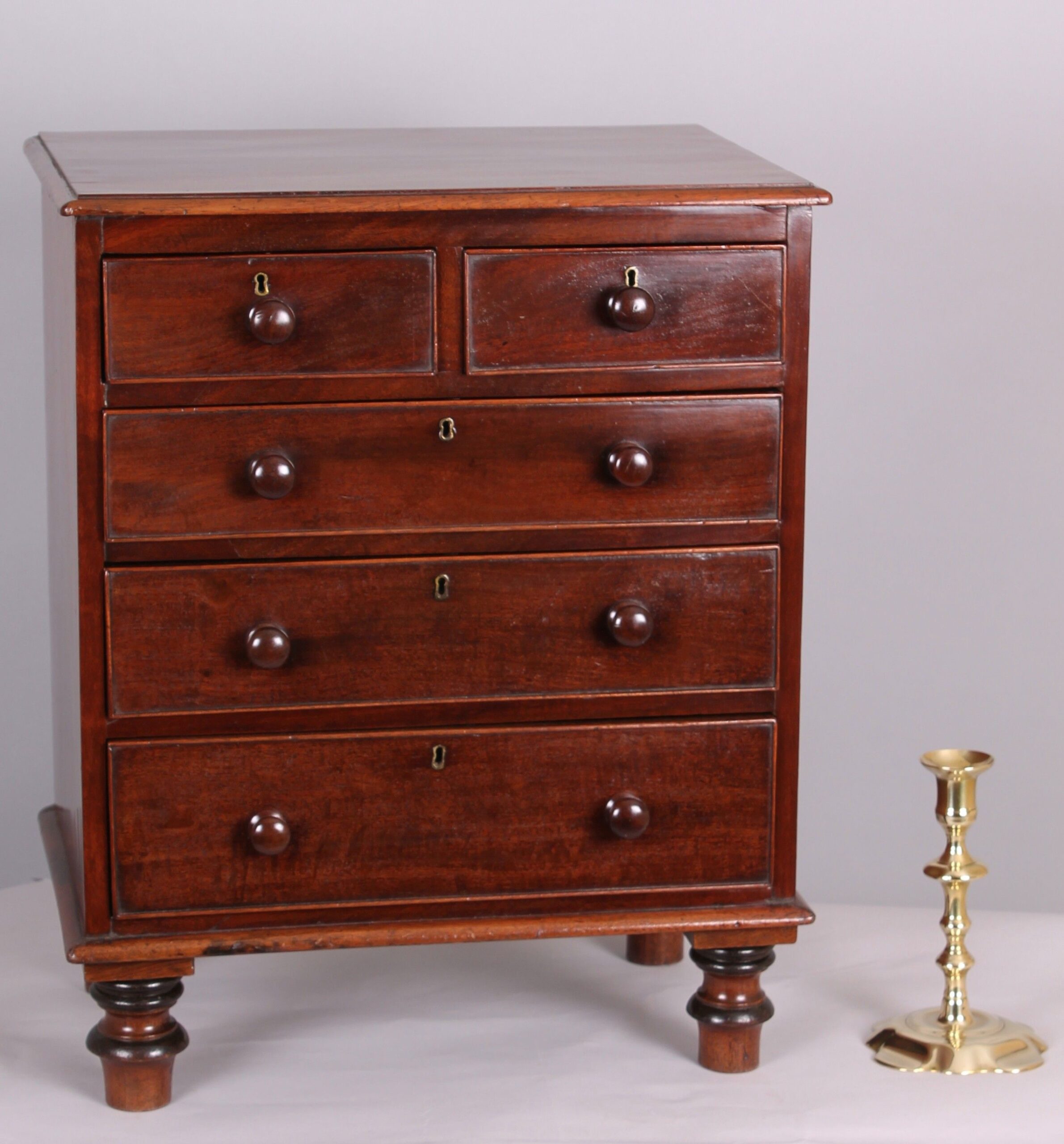 Early Victorian mahogany miniature chest of drawers