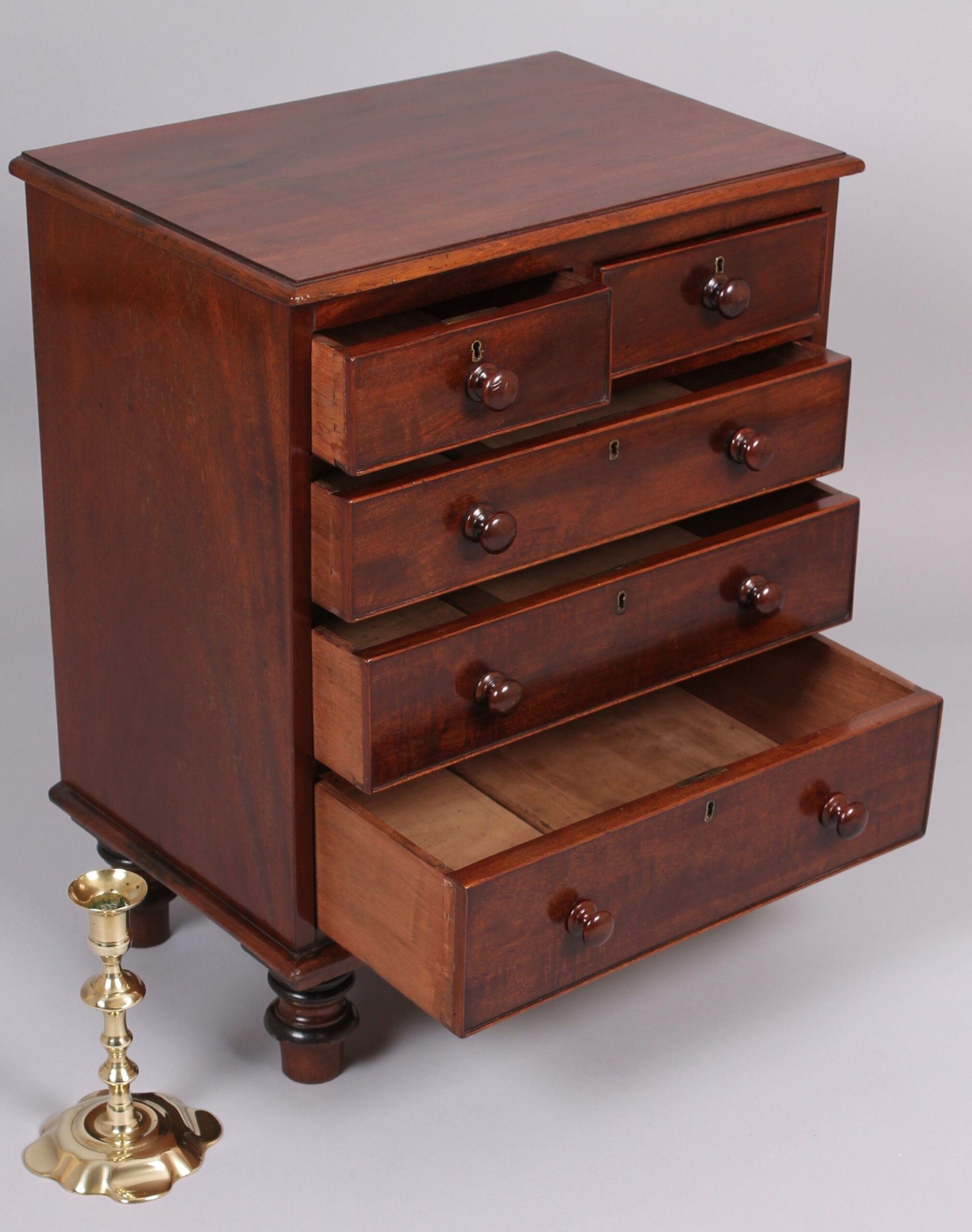 Early Victorian mahogany miniature chest of drawers