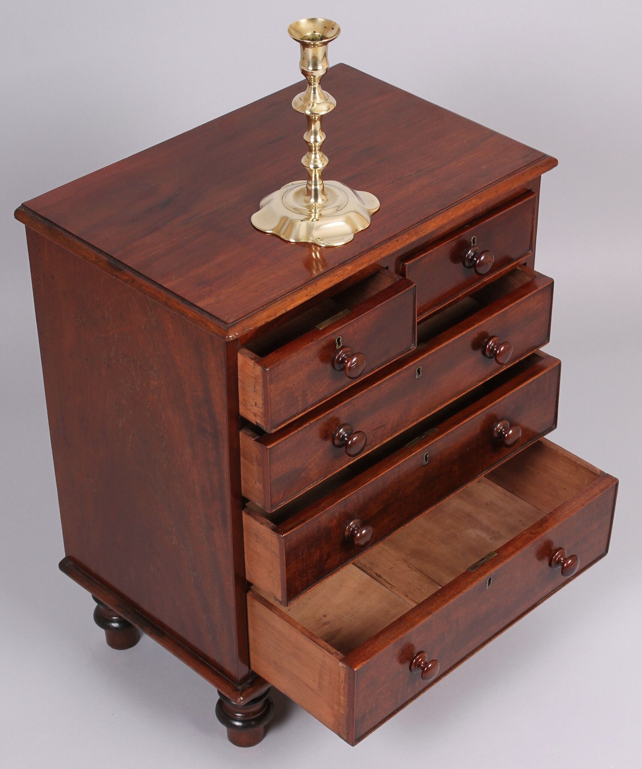 Early Victorian mahogany miniature chest of drawers